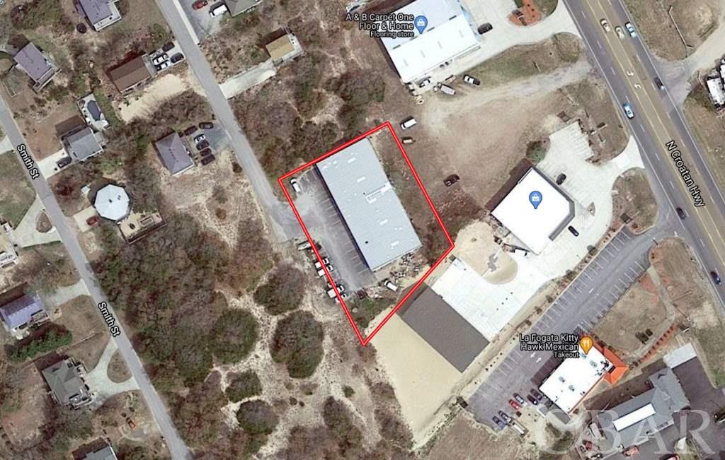 Searching for commercial space?! Then take a look at this newly renovated unit located just off of N Croatan Highway! Featuring a garage area, a bathroom, and a total of 5 offices, a lobby. This newly renovated unit is the perfect place for your business on the OBX!  2,100 Square Foot Commercial Unit For Sale in Dare County NC! Take a look at this commercial unit that is now available right off of N. Croatan Highway. This property has recently been renovated. There is a garage area as well as an upstairs and downstairs office space. There are a total of two offices downstairs with a lobby and a bathroom. Upstairs there are three offices, one of which overlooks the garage area through a large window. The garage area also has a large bay door and a single door while the lobby has a glass door. There is a survey of the lot, totaling 0.72 acres, as well as unit 102 showing the exact square footage for the upstairs and the downstairs.  The renovations include:  The entire unit was painted. All of the lights were upgraded to high-quality LED lights, New faucet, Carpets were professionally cleaned, Commercial LVT tile was added in the upstairs office and downstairs reception/lobby, as well as the bathroom.  A completely new Heat Pump was installed.