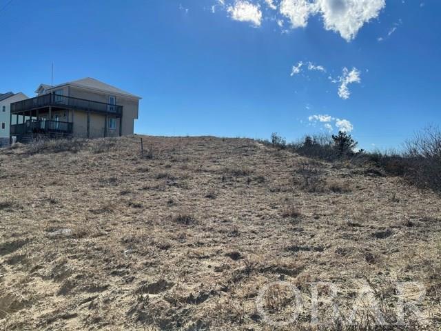 Beautiful X flood zone Semi oceanfront in North Swan Beach!  This is a perfect site with lots of elevation for a future beach house.  Should have excellent ocean views and has VERY easy beach access.