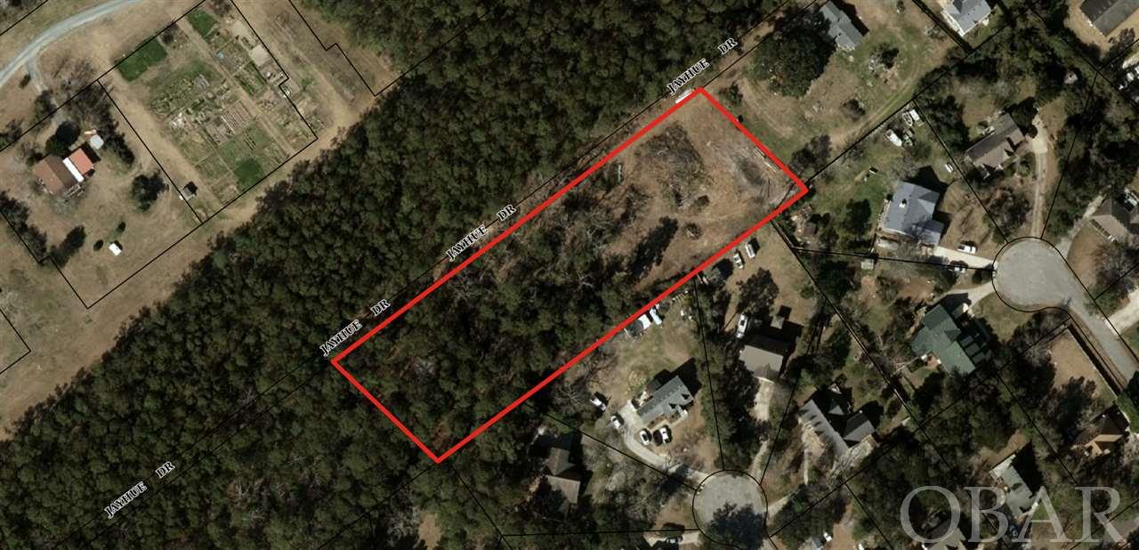 HUGE lot with so much potential.  This beautiful wooded lot would make the perfect place to build your Dream home.  Enjoy the massive yard and privacy.  Walk right out your door and enjoy the bike path to the North End or Downtown Manteo.  Walking distance to all schools and just a 10 minute drive to the beach.  This lot is in the perfect location.