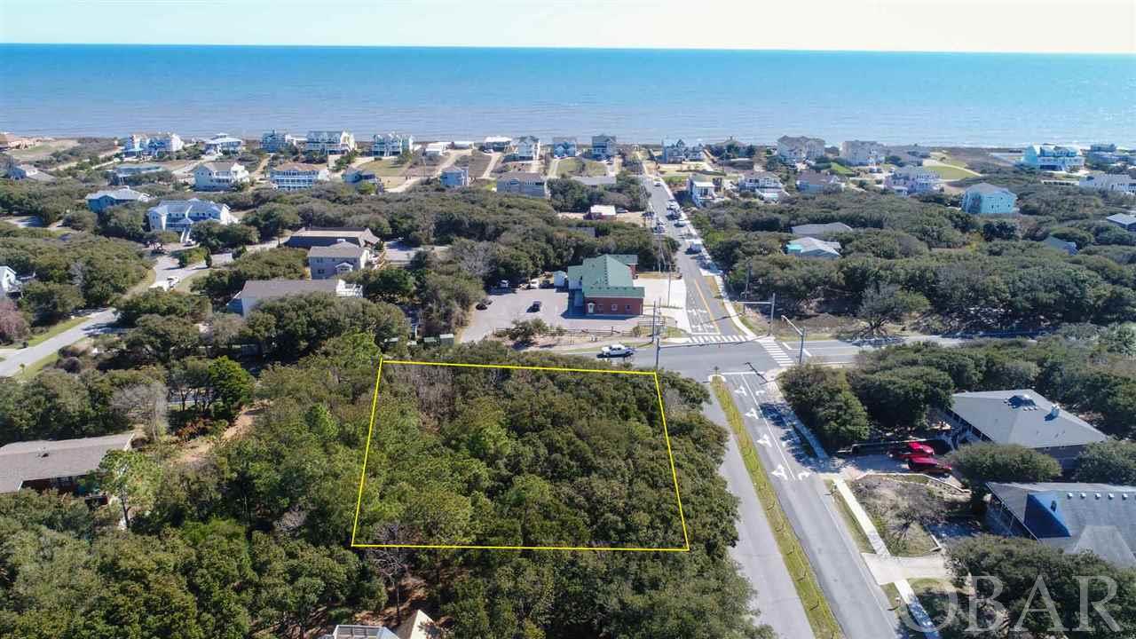Large square, corner lot! X Flood zone! Over 24,000 square feet. Just 250 yards to the nearest beach access, with a stoplight and crosswalk. A great opportunity to build your primary home, second home, or rental property! Possible ocean views from your top floor. Join the Southern Shores Civic Association to have access to all 33 beach access walkways and dune crossovers in Southern Shores, the Hillcrest Drive beach parking area, three marinas: North Marina, South Marina & Loblolly Marina, tennis courts, playgrounds, and numerous natural open green spaces. SSCA dues are $65 for residents and second home owners, and $95 for rental property owners, annually. A great value for your money! Boat Club and Tennis Club memberships are an additional $25 each.