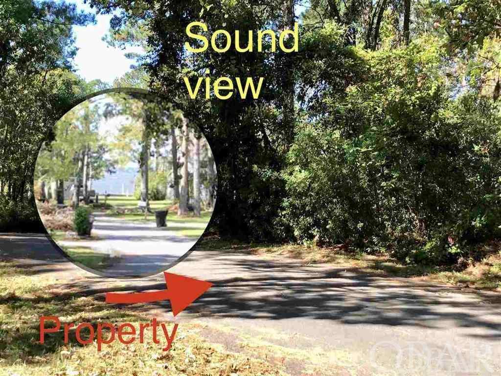 Sound view from the road in front of the property. The common area gives sound access with a generous sized beach area and picnic area, just around the corner from the property within walking distance.