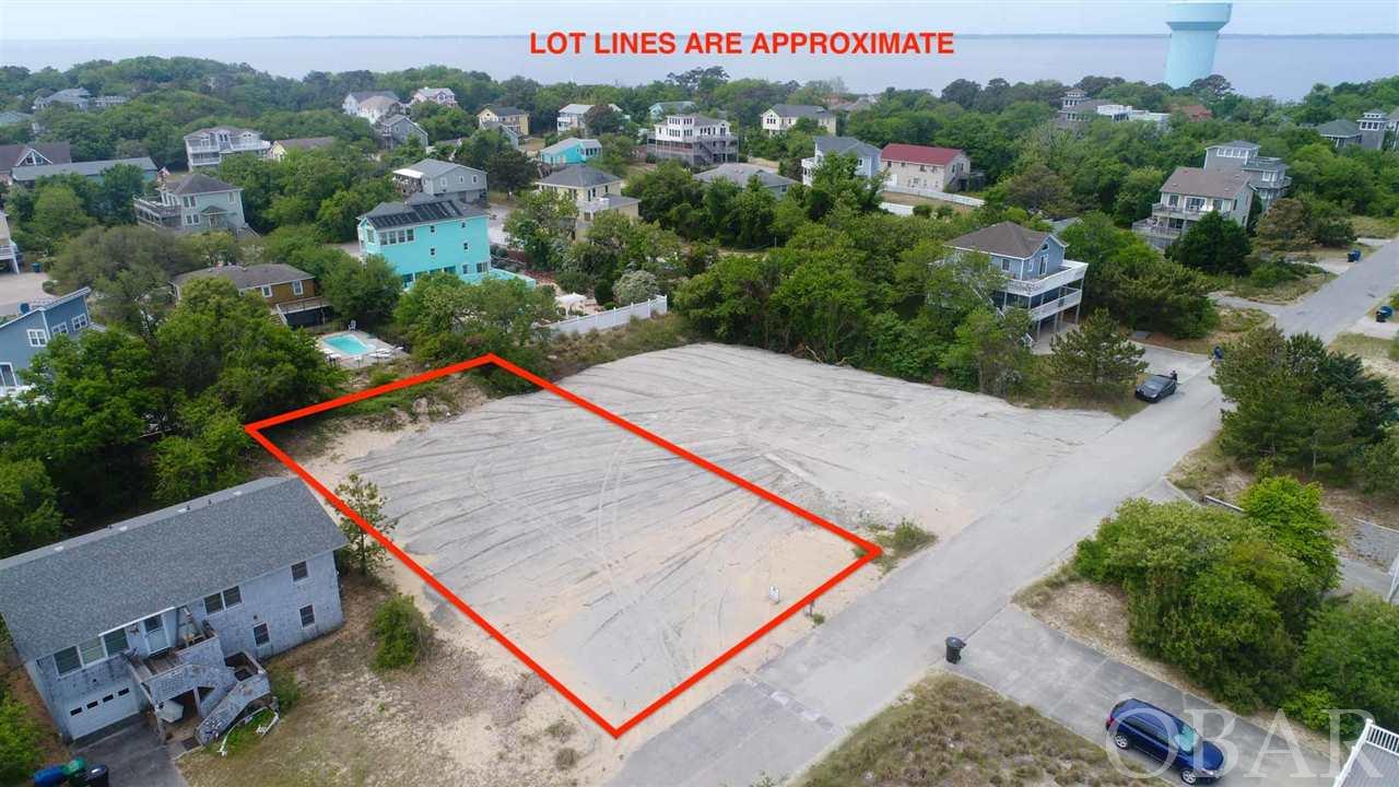 Beautiful building site in Duck Oceanside that has been cleared and filled and is ready for your new home!  Home built on this lot should have some views of the ocean and sound.  Close direct beach access at the end of Bayberry.  This property is conveniently located in the town of Duck and is so close to great shopping, dining and even the Town of Duck soundfront boardwalk.  Bayberry Bluffs is directly across the street from Tommy's Market in Duck.  A great opportunity!