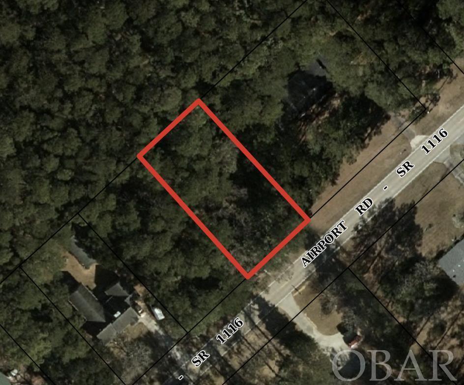 Tucked away in the Evansville Subdivision of Manteo, this wooded lot offers location value and close proximity to Dare Co. schools, area attractions and downtown Manteo.  This .29 acre lot is designated as an X flood zone and is ready for a custom-built home.  Municipal water hook-up fee is paid, just connection is required.  The adjoining lot, 171 Airport Road (lot 66) is also for sale.