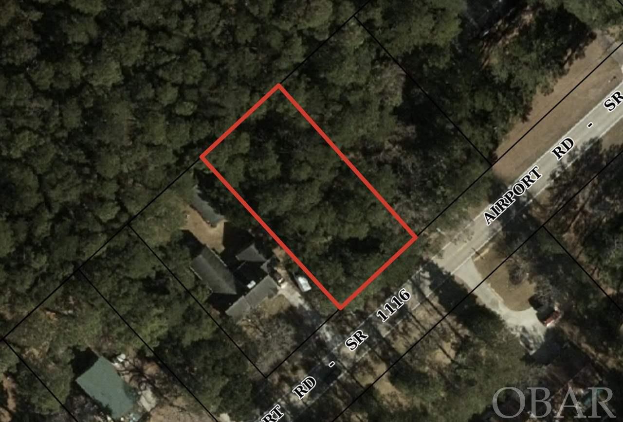 Tucked away in the Evansville Subdivision of Manteo, this wooded lot offers location value and close proximity to Dare Co. schools, area attractions and downtown Manteo.  This .29 acre lot is designated as an X flood zone and is ready for a custom-built home.  Municipal water hook-up fee is paid, just connection is required.  The adjoining lot, 167 Airport Road (lot 67) is also for sale.