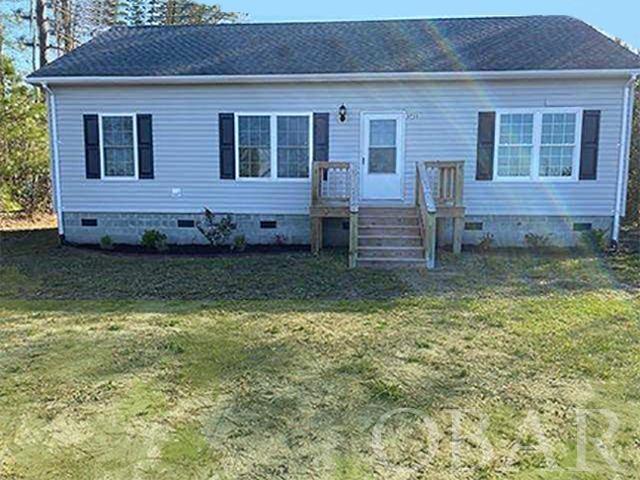 Well constructed factory built home. Energy saving features include 6" exterior walls, 9ft. ceilings.  Has front entrance deck and side deck. Large 1/2 acre lot offers room for garden, pool and other possibilities.  Vinyl siding and soffit for easy maintenance