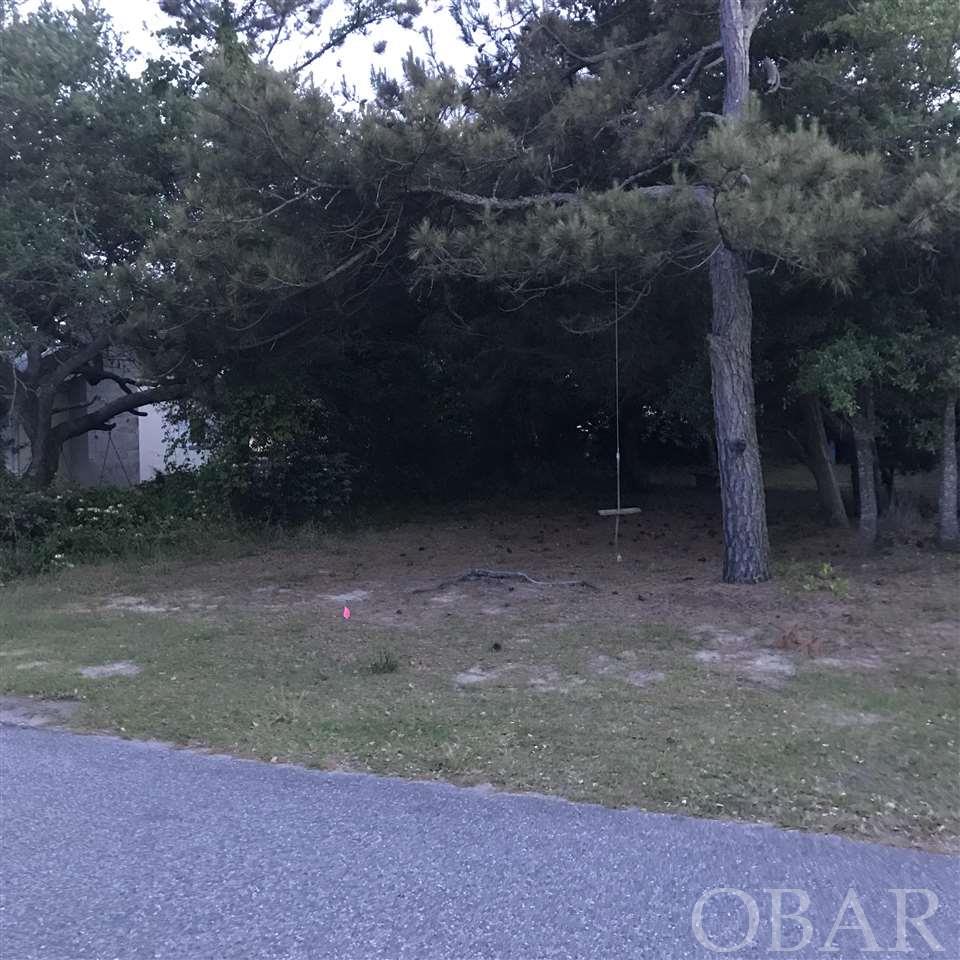 This lot is 5,000 sq. ft. level with a trees including a nice pine tree with a swing.  This property is located in the popular westside of the Avalon Beach Subdivision. lt includes beach access, parking and you will enjoy an easy walk to the sound with public access. Enjoy the fire pit with family & friends.