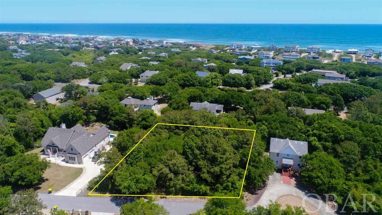 Large square lot in Southern Shores! X Flood zone! Over 19,000 square feet. Just 0.25 miles to the nearest beach access, with a stoplight and crosswalk. A great opportunity to build your primary home, second home, or rental property! Possible ocean views from your top floor. Conveniently located only minutes away from the finest restaurants and local attractions of Duck, Southern Shores, and Kitty Hawk. Join the Southern Shores Civic Association to have access to all 33 beach access walkways and dune crossovers in Southern Shores, the Hillcrest Drive beach parking area, three marinas: North Marina, South Marina & Loblolly Marina, tennis courts, playgrounds, and numerous natural open green spaces. SSCA dues are $65 for residents and second home owners, and $95 for rental property owners, annually. A great value for your money! Boat Club and Tennis Club memberships are an additional $25 each.