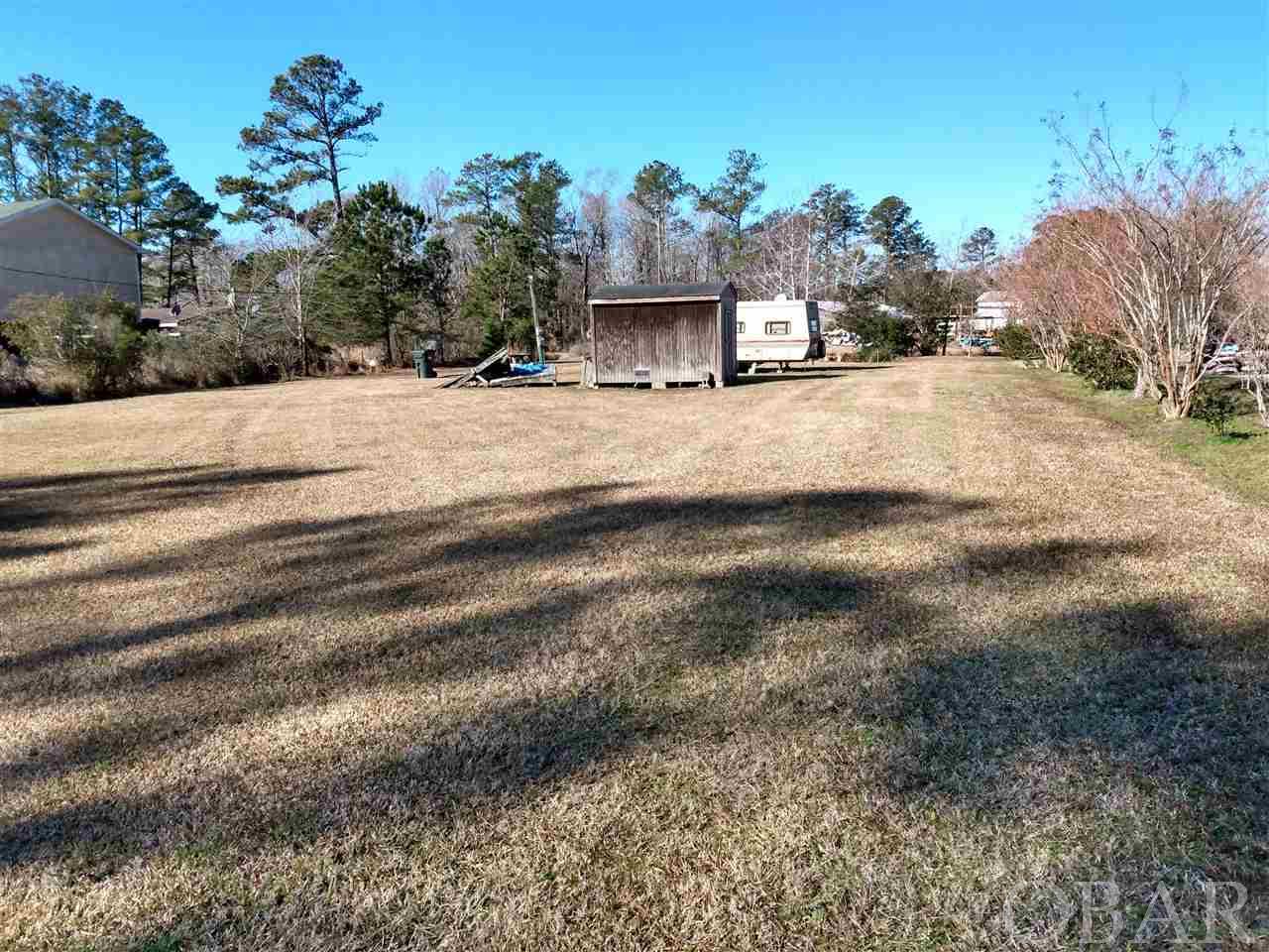 CANAL LOT NAVIGABLE TO SCUPPERNONG RIVER This .6 acre spacious canal lot is navigable to the Scuppernong River near Columbia, N.C.  It includes a 26' X 8' RV home and storage shed. Excellent site for a home, vacation spot or a stopping destination in route to the N. C. OBX!