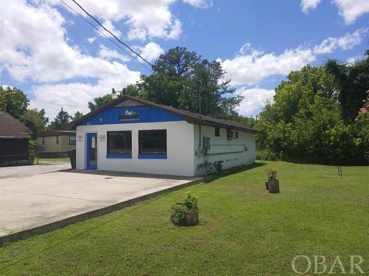 ONLINE BIDDING OPENS JULY 26 at 9:00 am and CLOSES JULY 29 at 11:00 am ET. List price based on tax value. Early offers presented. Income Producing Self-Serve Laundromat, Clean, low maintenance building, extra wooded lot behind Paved parking 5 cars, plus rear grass parking, 10 washers/dryers, low annual utilities. Here's a very affordable way to run your own business! Low maintenance, cinderblock building with concrete slab floor. Regular cash flow +/- $2,000 gross income per month. Rinnai tankless natural gas on-demand hot water heater, 2 wall-mounted split HVAC units, 10 Whirlpool Washers and dryers, local repair technician Upside potential: Fix existing soda machine, add snack machine, add oversize washer/dryer(s), clear adj lot for rental trailer or other approved use.