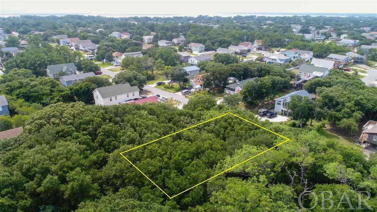 This  lot could be the site for your future dream home!! Perfectly located in a quiet neighborhood, yet central to all the dining, shopping and entertainment that the Kill Devil Hills to offer! Come and visit today!!