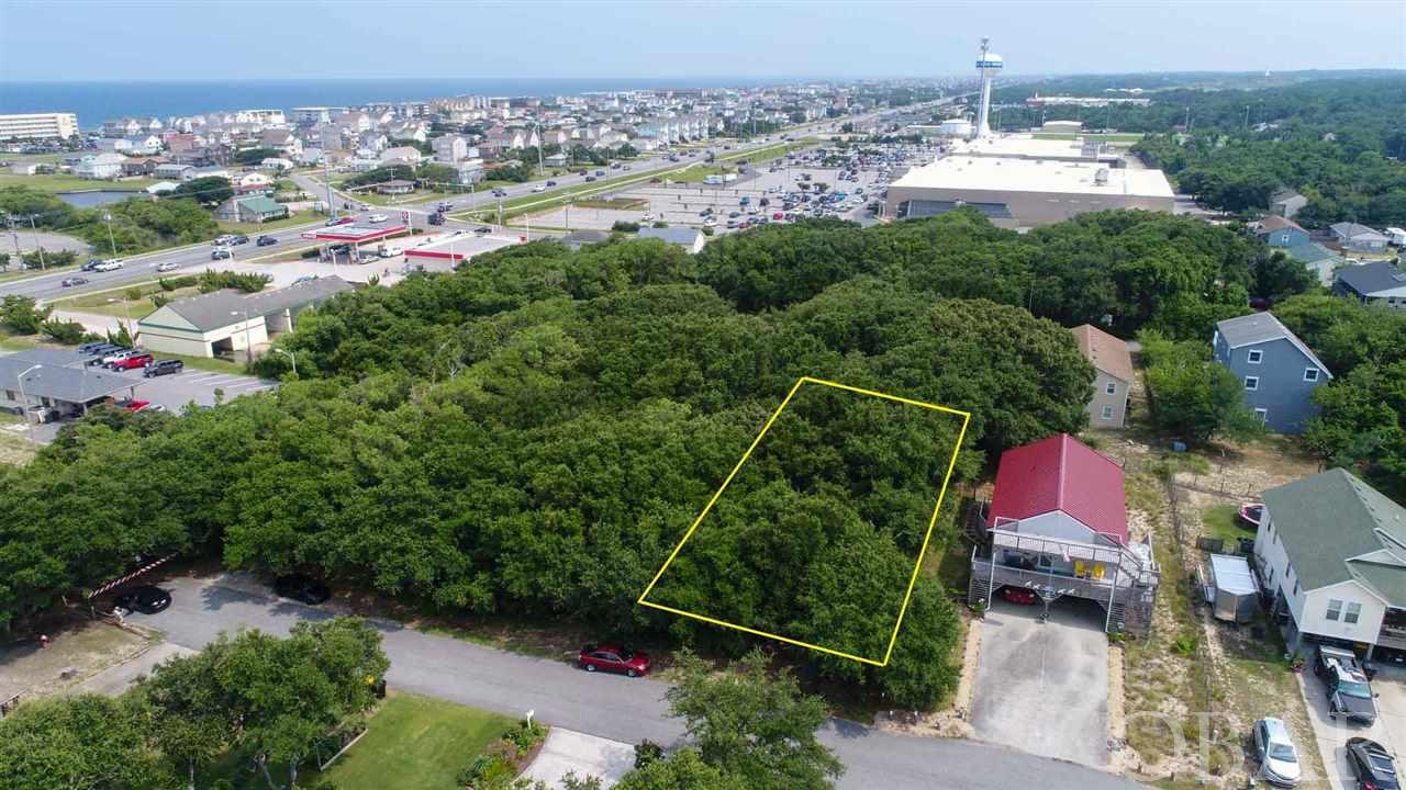 This lot could be the site for your future dream home!! Perfectly located in a quiet neighborhood, yet central to all the dining, shopping and entertainment that the Kill Devil Hills to offer! Come and visit today!!