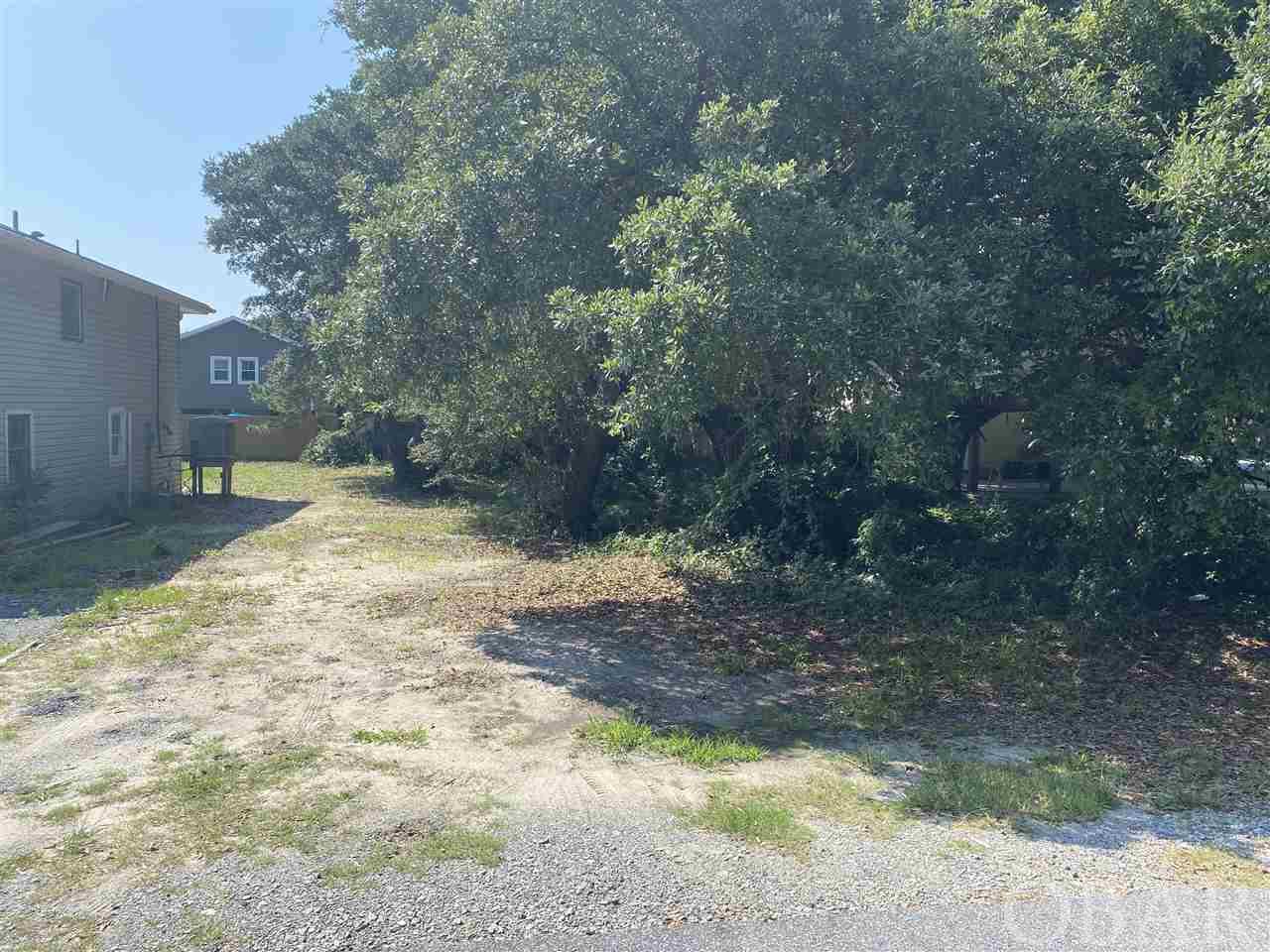 Nice building lot located in the heart of Kill Devil Hills.  The property is a short walk to scenic Bay Drive and less than a mile from the public boat ramp.  There are tons of popular restaurants, shopping and attractions within a short distance of this lot.  Build your custom Outer Banks dream home.