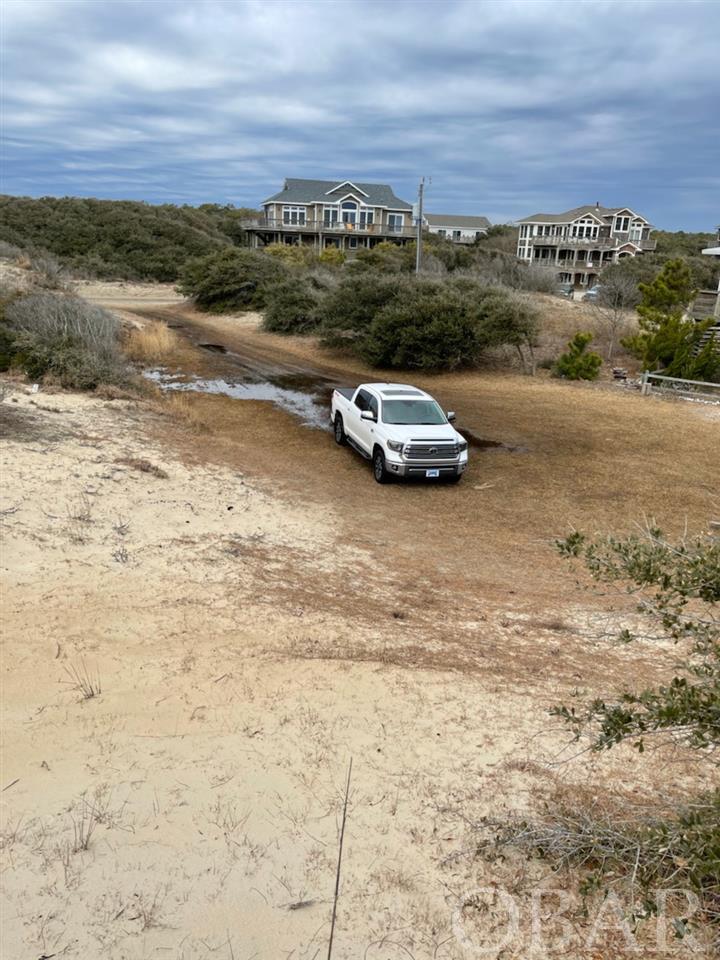 Oceanfront lot close to the Virginia State line. Lot has good elevation on the oceanside with a stable dune line. The westside of the lot is low as witnessed  by the pictures.  ESTATE LIQUIDATION SALE!