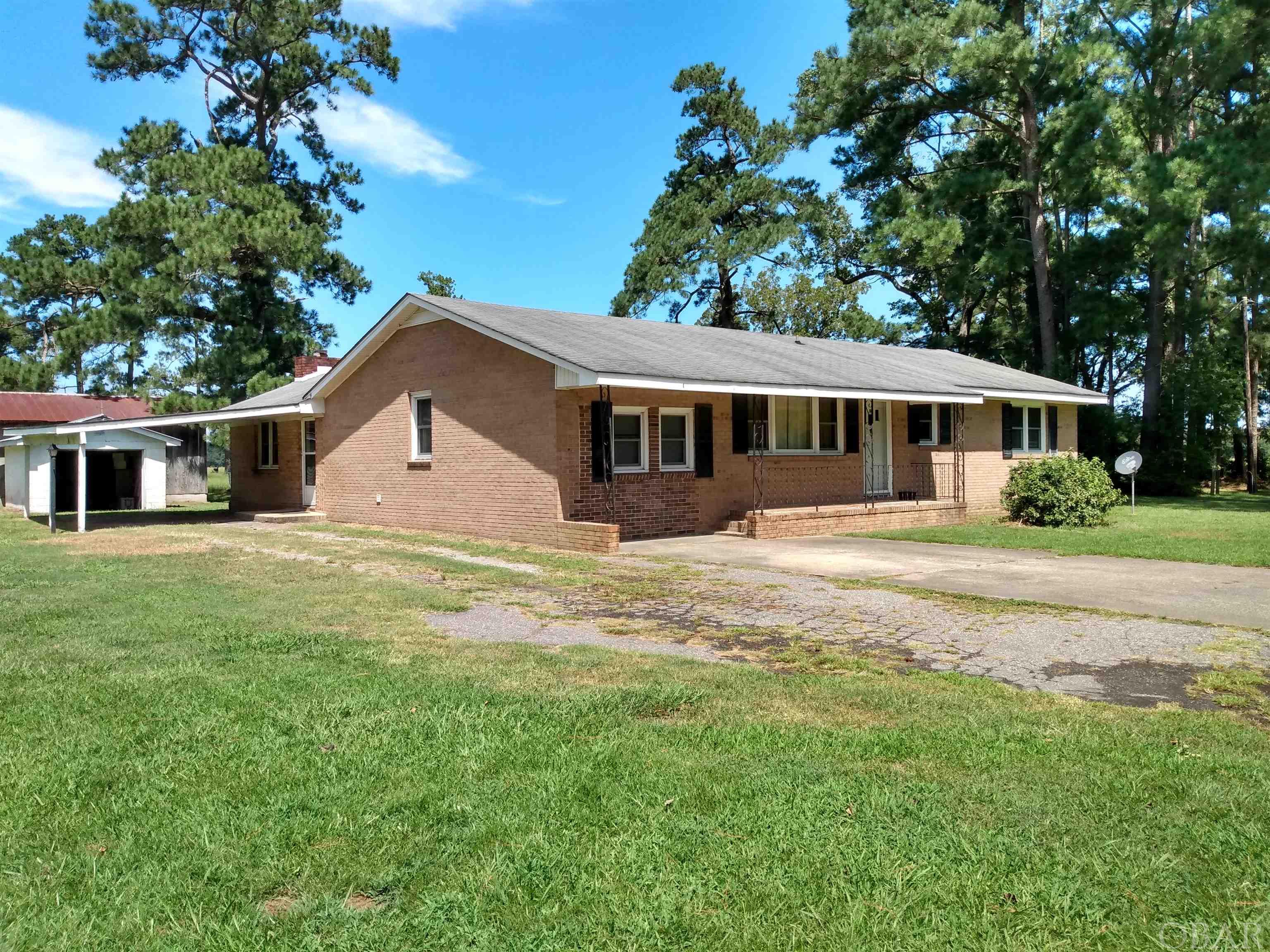 Nice 3BR, 2BA Brick Ranch Home with large family room, hardwood floors, fireplace, carport and storage-workshop. Excellent rental property. Readily accessible and conveniently located just 3.5 west of Columbia, N.C. off of US highway 64 (Travis Exit). Within an hour from Nags Head, N.C. Ready to move in! Priced to sell!