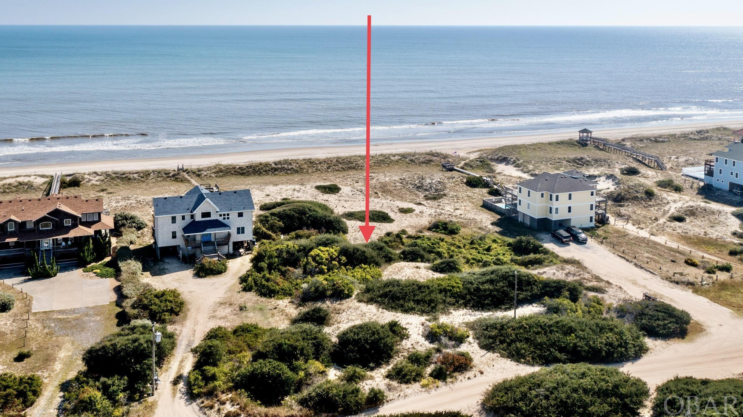 Gorgeous ocean front lot with endless views and great elevation on this lot where the wild horses of Corolla roam.