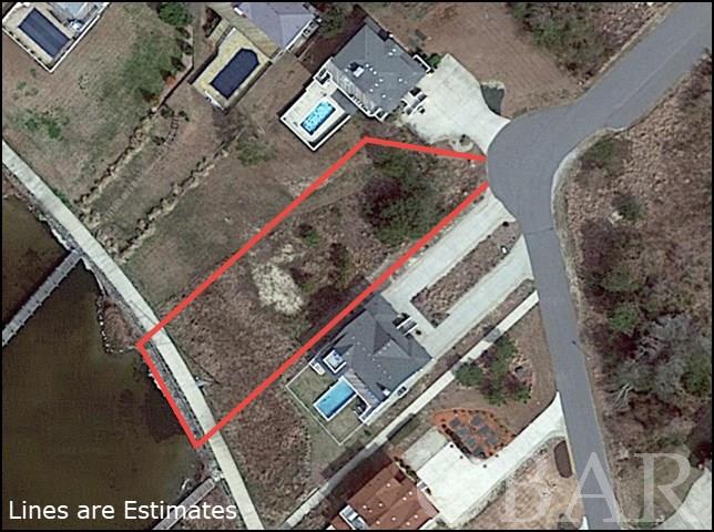 The last sound front lot in the exclusive gated community of First Flight Ridge located in Kitty Hawk. Close to all the year-round amenities. Perfect for a primary home, secondary home or a waterfront investment property.  The community is complete with a pier and only moments away from the beautiful beaches of Kitty Hawk.