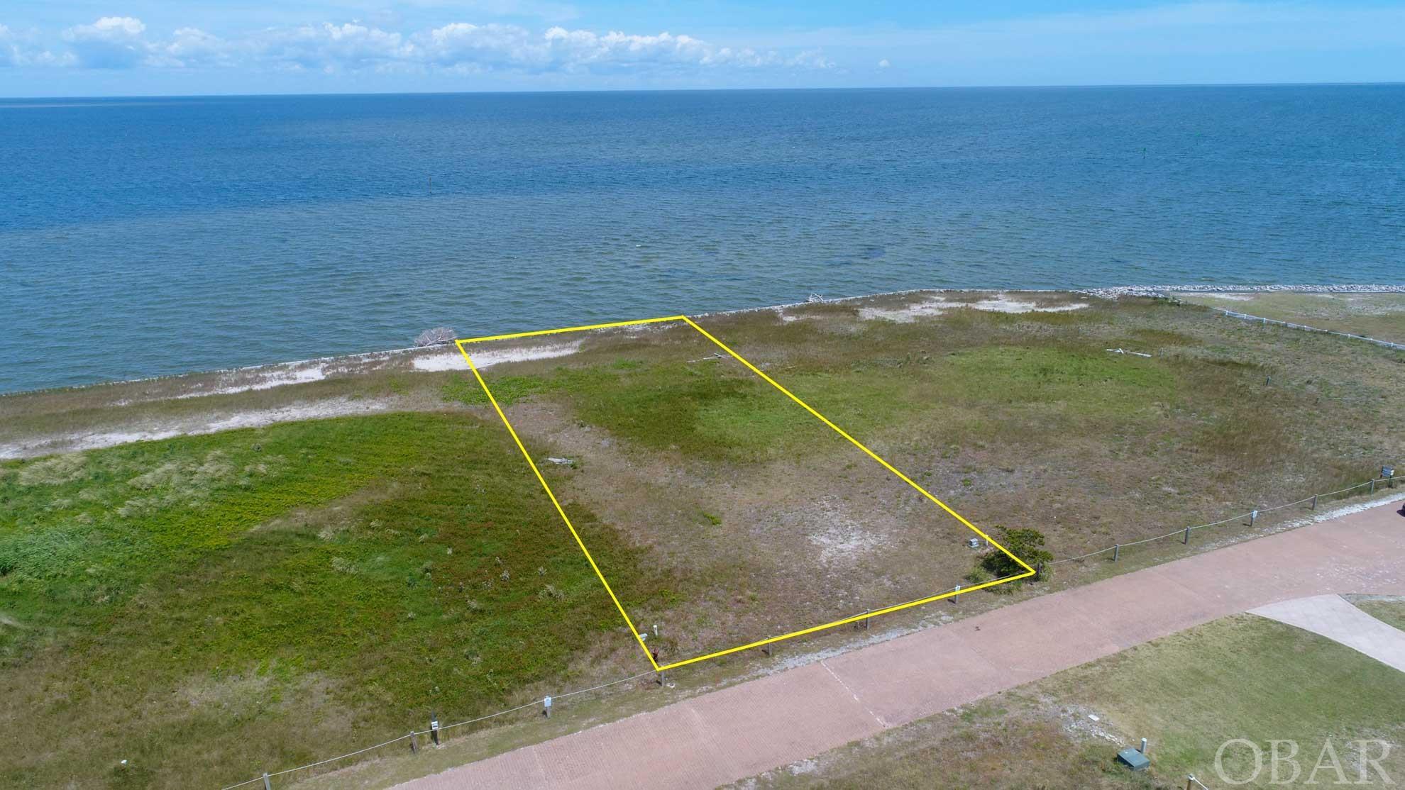 Great opportunity to be overlooking the Pamlico Sound. Enjoy summer sunsets and watch the boats after fishing. Great neighborhood close to shops and Hatteras Harbor marina, yet nestled back away from Hwy 12.
