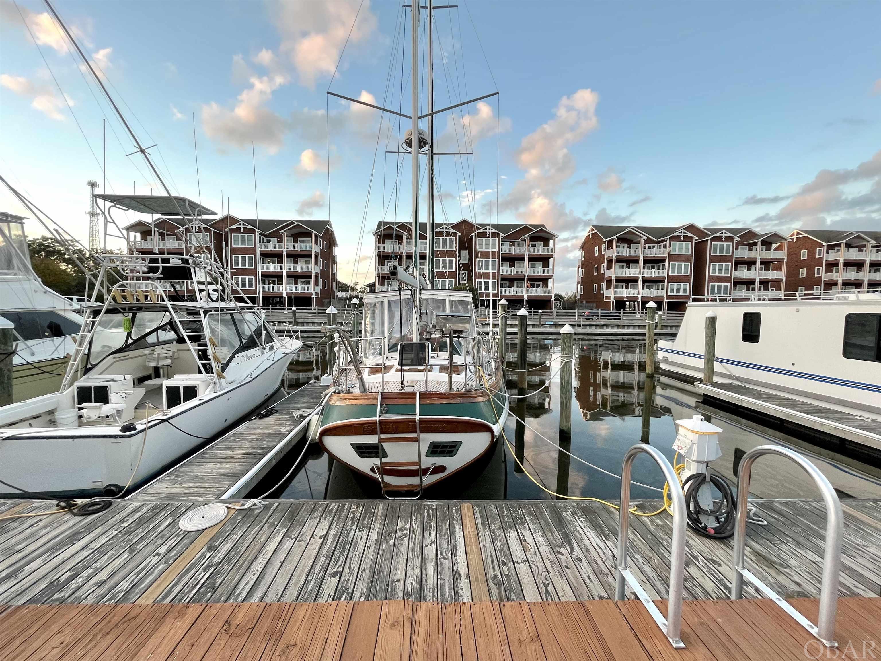 Protected boat slip in highly coveted Shallowbag Bay.  Enjoy the community amenities that include, buy are not limited to a community pool, fitness center, and clubhouse.  This slot is tucked back away from open water and open great protection.