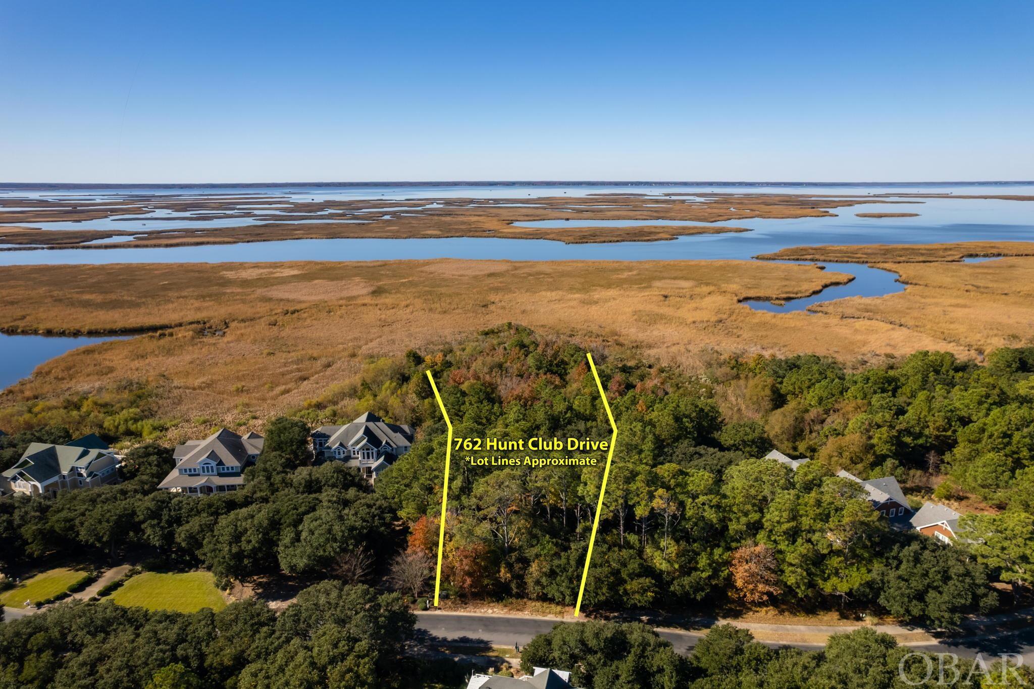 Build your custom home on this soundfront parcel located in the gated community of The Currituck Club.  This large, private homesite promises the opportunity to enjoy gorgeous views of sound and sunset in one of the most sought after amenity-rich communities on the OBX.  The Currituck Club offers in-season concierge & trolley service, a fitness center, community pools, tennis & basketball courts, membership to the renowned Ree Jones deigned 18-hole golf course, and more.  Close to shopping, restaurants and attractions, this parcel is the spot for your own custom-built dream home!