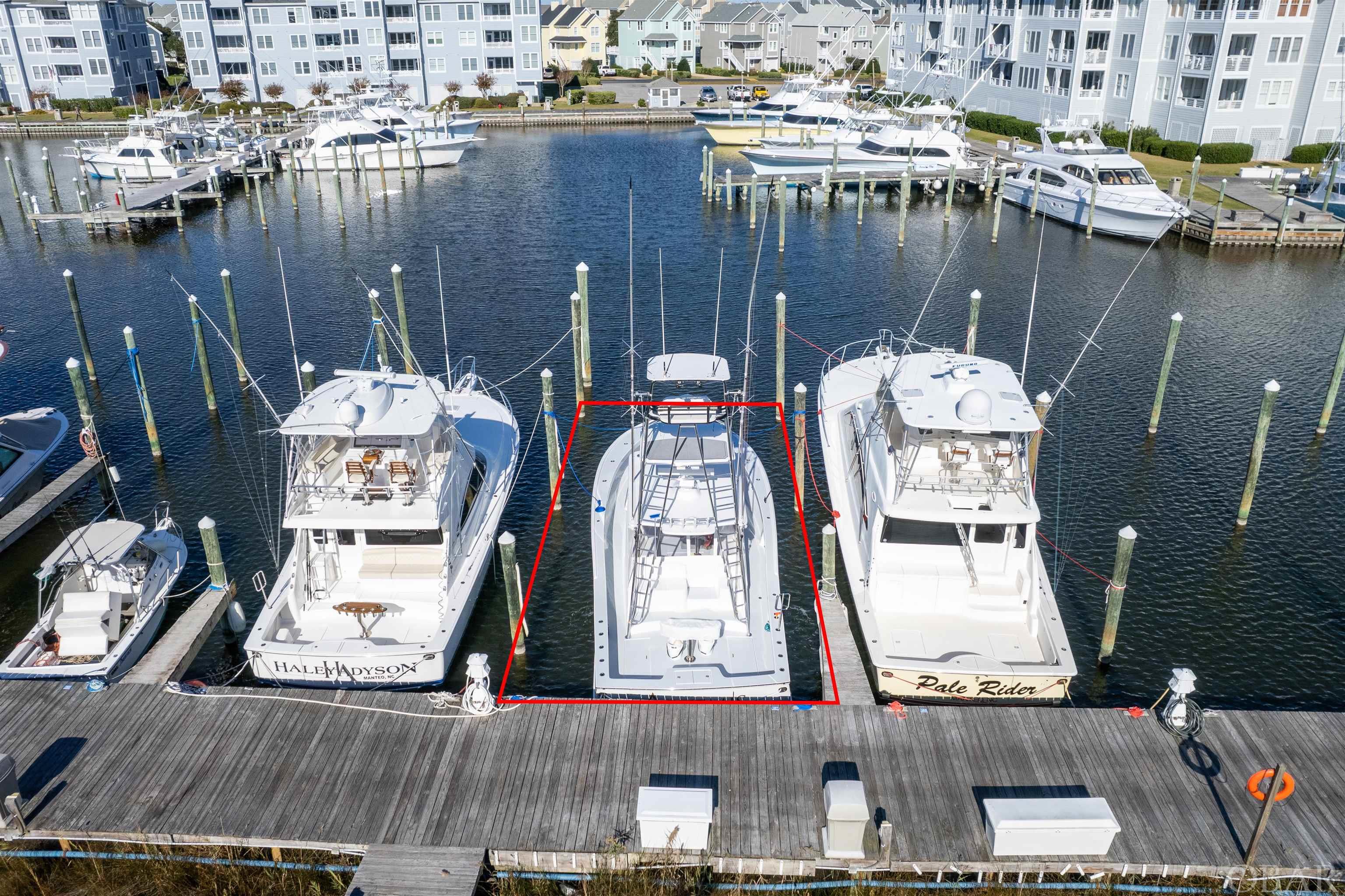 Located on G Dock, this 75FT x 21.6W boat slip has location value with easy sound access and parking.  Pirate's Cove Marina is a protected, deep water, full service marina with 195 slips and a charter fleet of sport fish boats for offshore, nearshore and inlet fishing.  Pirate's Cove Marina is one of the largest world-class marinas on the East Coast with a high level of experienced charter sport fishing captains and crew. Pirate's Cove Marina offers: a fuel dock for non-ethanol gas and diesel, slips with in-slip fueling, private fish cleaning houses, showers, Ship's Store for light provisioning, an on-site full-service restaurant and Tiki Bar, and annual fishing tournaments.  Pirate's Cove Marina is approximately eight miles inside and north of Oregon Inlet via a deepwater, well-marked channel. The fixed bridge clearance of the Manteo/Nags Head causeway is 65 feet at mean high tide.