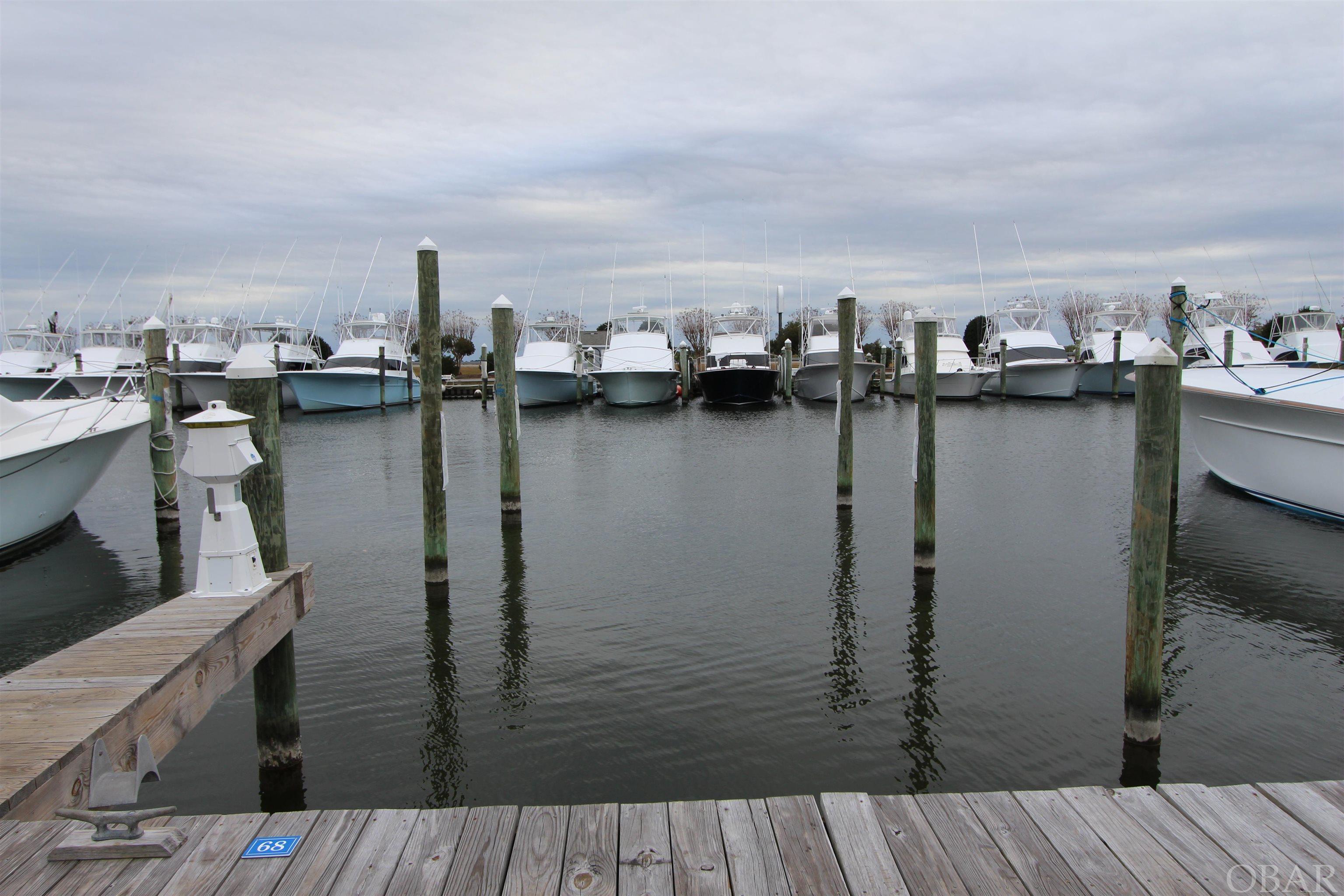 55' Deeded Slip with a 5' spring line allowance up to 60'. Approximately 18'6" wide. Opportunity to have a secure slip for your boat in the WORLD CLASS MARINA.  Adjacent to parking, the Tiki Bar, Ships Store, Bluewater Grill and Tournament Pavilion. Prime location!  Slip Owners may use the Pirates Cove Amenities, clubhouse/pool, lighted tennis courts, playground and fitness center for $5/per day, per/person. Water Included in Slip Owners Fee.
