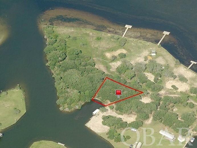 Check out this beautiful Semi-soundfront canal lot. Larger than most lots in the subdivision and has plenty of room to build on. The lot already has a bulkhead & pier installed and sits at the end of a finger canal providing more privacy and protection from the boat traffic going in and out of the sound. Seller is also willing to consider owner financing with a full price offer.