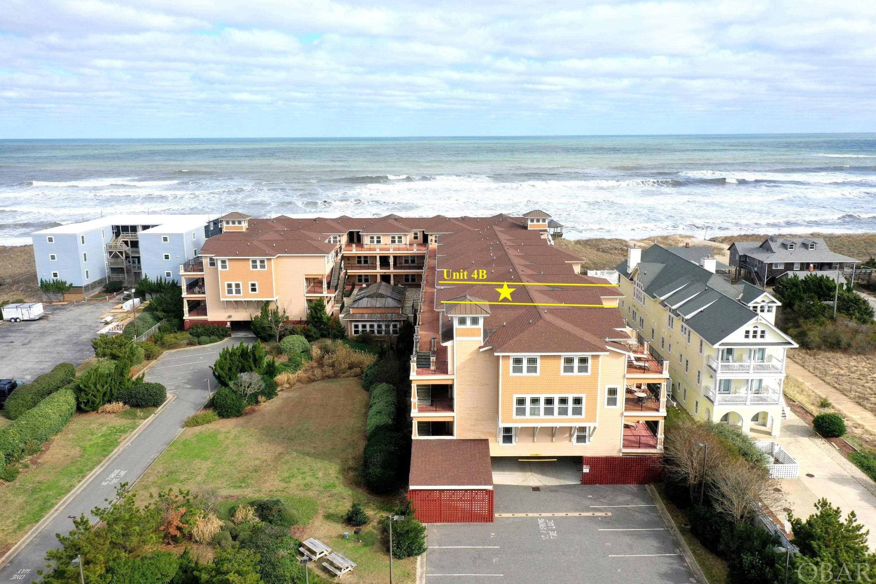 This 3-bed, 3-bath, top floor unit offers everything you need for luxury oceanfront living. The unit resides at The Croatan Surf Club, an ultra-luxury resort condominium community here on the Outer Banks. You will enter into a large, one-level living space with vaulted ceilings that drench the condo with natural light. The open kitchen is complete with granite countertops, custom cabinetry, stainless steel appliances, and an eat-in bar. Entertaining guests? Not a problem, with the open floor plan into the greatroom and dining areas completely with hardwood floors. Step out onto the private balcony and relax on the rocking chairs with the partial oceanview. Don't forget the 2 master king bedrooms, one queen bedroom, all complete with custom tile baths and jetted tubs. Make sure you take the elevator down to access the expansive ocean front pool complex. The outdoor community area is complete with an 84' pool and separate children’s pool with spray ground, dune-top boardwalks, gazebo, shower sprays, and a highly vegetated adult spa area. That's not all! Indoor facilities include: a fitness center, heated pool, and spa with translucent tops. Don't miss out on this first-class establishment!