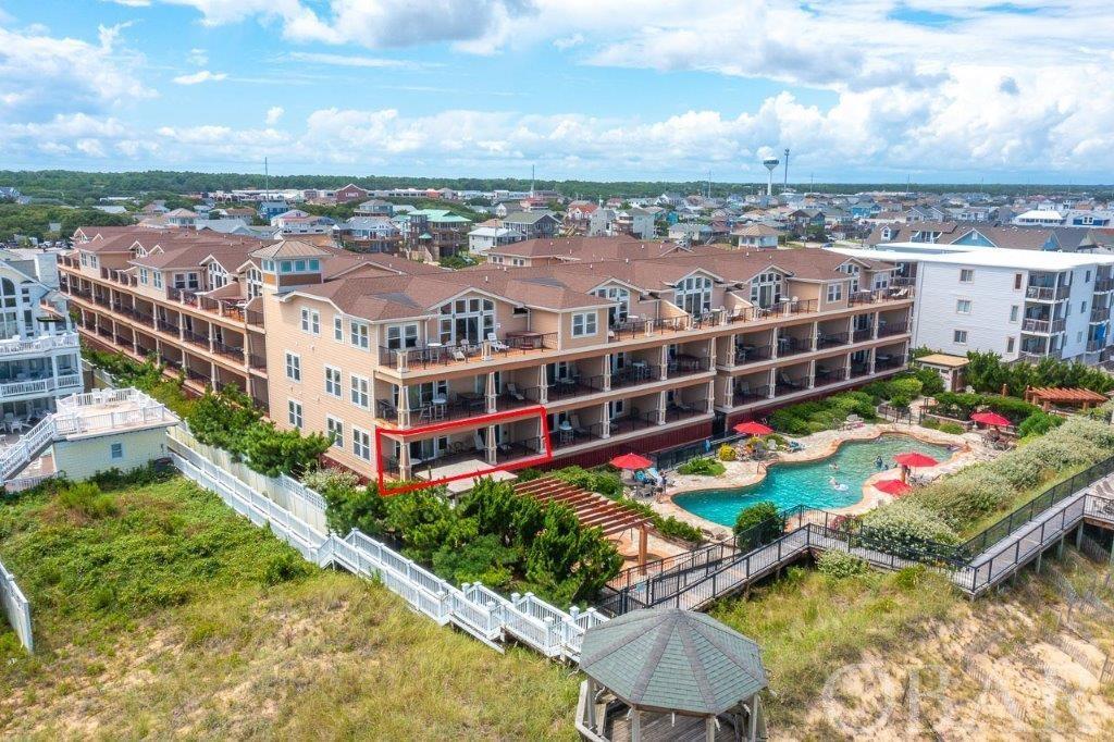 Sunny South End Oceanfront Flat located in the Prestigious Oceanfront Resort, Croatan Surf Club. This First Class Community boasts all the amenities one could desire for a fabulous beach vacation. This 3 bedroom/3 bath property has upgraded appointments throughout including hardwood floors, custom tile, granite countertops, fireplace and much much more. Enjoy the views of the ocean, the oceanfront custom 84' outdoor pool and outdoor spa from the 10' x 32' covered oceanfront terrace. Other amenities include a children's pool with spray ground, indoor heated pool with spa, workout facility, boardwalk to the beach with gazebo and of course access to one of the best beaches on the East Coast. Sold furnished for ones immediate enjoyment either as a place to call home at the beach, for the discriminating vacationer or great rental investment. Check out the Croatan Surf Club Today!!!