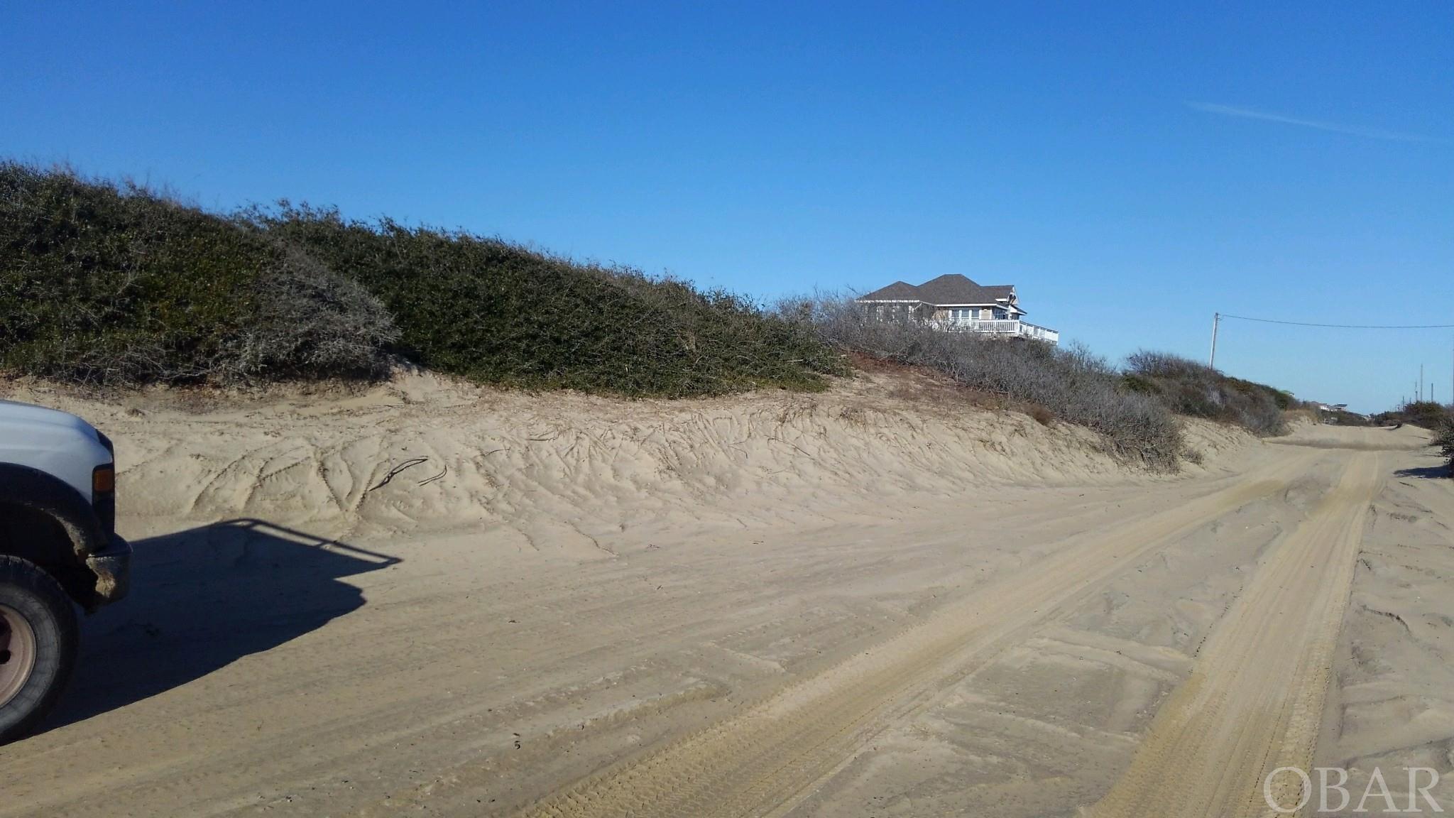 Beautiful High Semi Oceanfront Lot in a quiet area of the 4WD area of Corolla.