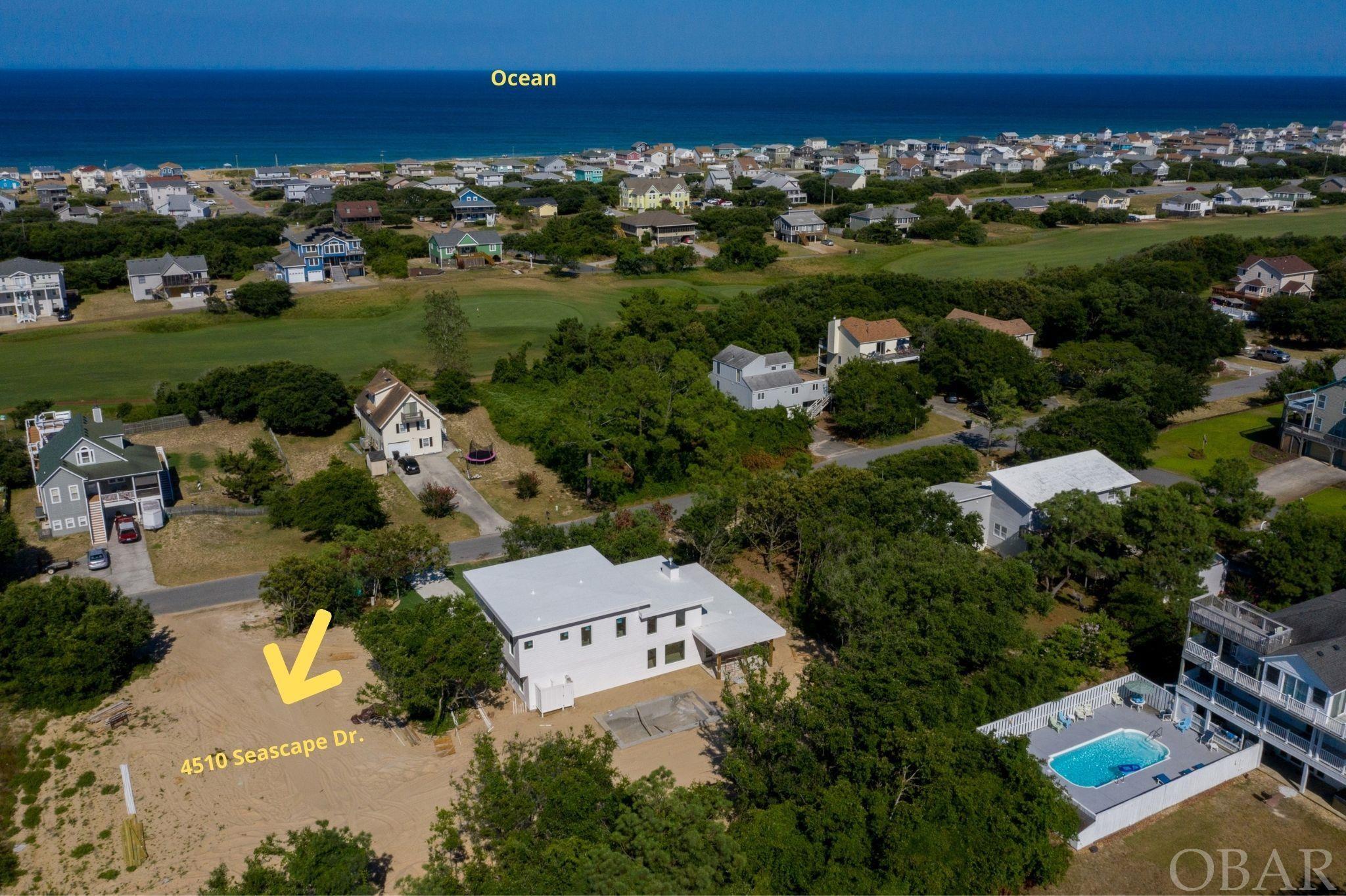 This spacious lot on the golf course in Sea Scape is cleared and ready for your dream home!  Whether your goal is to build your primary "forever" home, create an oasis to escape to with loved ones, or own an income-producing vacation rental, this location will fit your needs perfectly.  This lot has a high elevation with opportunities for enjoying horizon ocean views from the upper levels of your home!  Neighborhood intersects the bypass at a stoplight with crosswalk for easy access to the beach, as well as close proximity to golf and dining--park the car and ride your bike or golf cart everywhere.  This lot is totally turn-key--all that's missing is you!