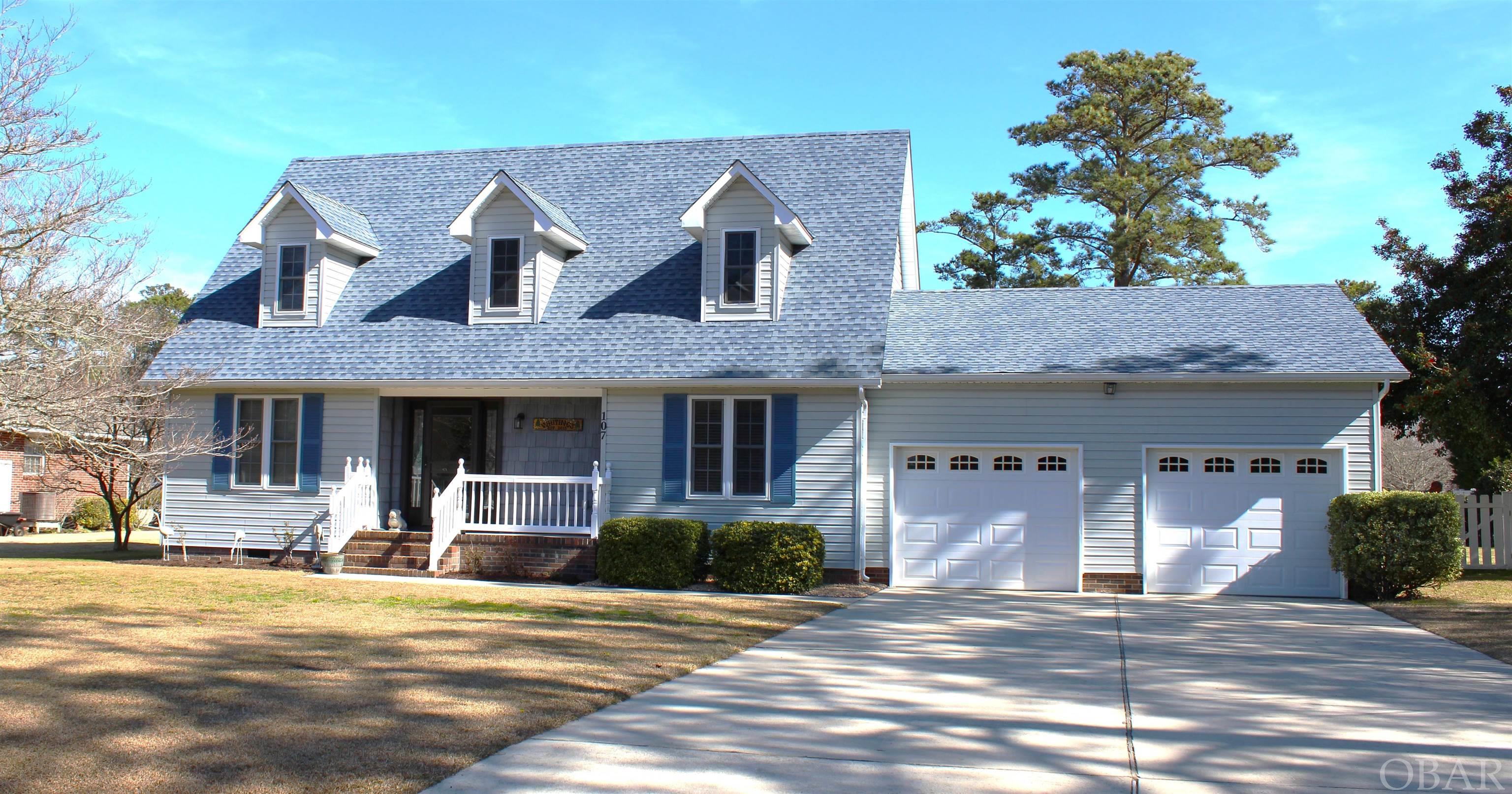 107 Inge Dr, Manteo- Beautiful 3bd/3bth home for sale in Manteo on a huge 22,000sq ft lot with a fenced in back yard and 2 car garage. If you are looking for a place to call home then you have to check out this house. As you walk into the house you enter the original portion of the house. This area has an updated ensuite bedroom, hall full bath, bonus room(currently used as a bedroom), office/playroom, and the massive open addition that includes the living, dining, and kitchen area. This area also overlooks the back yard and has access to the deck. Off the Living area there is a laundry room and sun room with access to the 2 car garage. The top floor has 2 more bedrooms that share a hall full bath plus there is storage off the hallway. New roof in 2020! Conveniently located on a cul-de-sac street in the heart of Manteo close to schools, downtown Manteo, area attractions, shops, and restaurants. The beach is approximately 15 minuets away. This house checks all the boxes so don't wait or it will be gone!