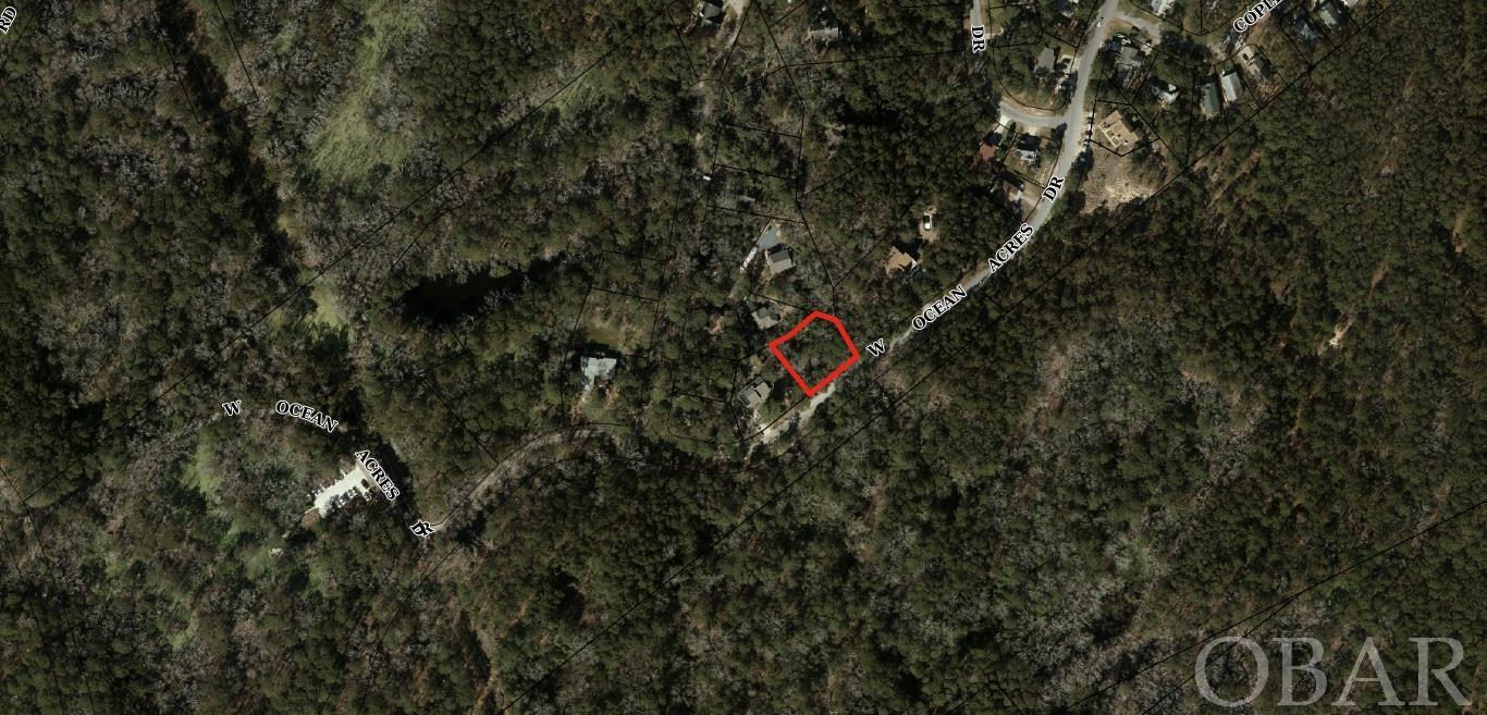If your looking for a home site that provides nature and privacy but close to the all the beach has to offer then this one is for you! Large lot within walking distance to Nags Head Woods Nature Preserve. Nags Head Preserve offers over 10 miles of hiking trails with plenty of wildlife, plants, birds, fish and mammals. You'll be surrounded by nature reminiscent of being in the mountains but yet your only 10 minutes from the pristine beaches of the Outer Banks. A perfect combination and a great spot to claim as your special Outer Banks home site, go check this one out!