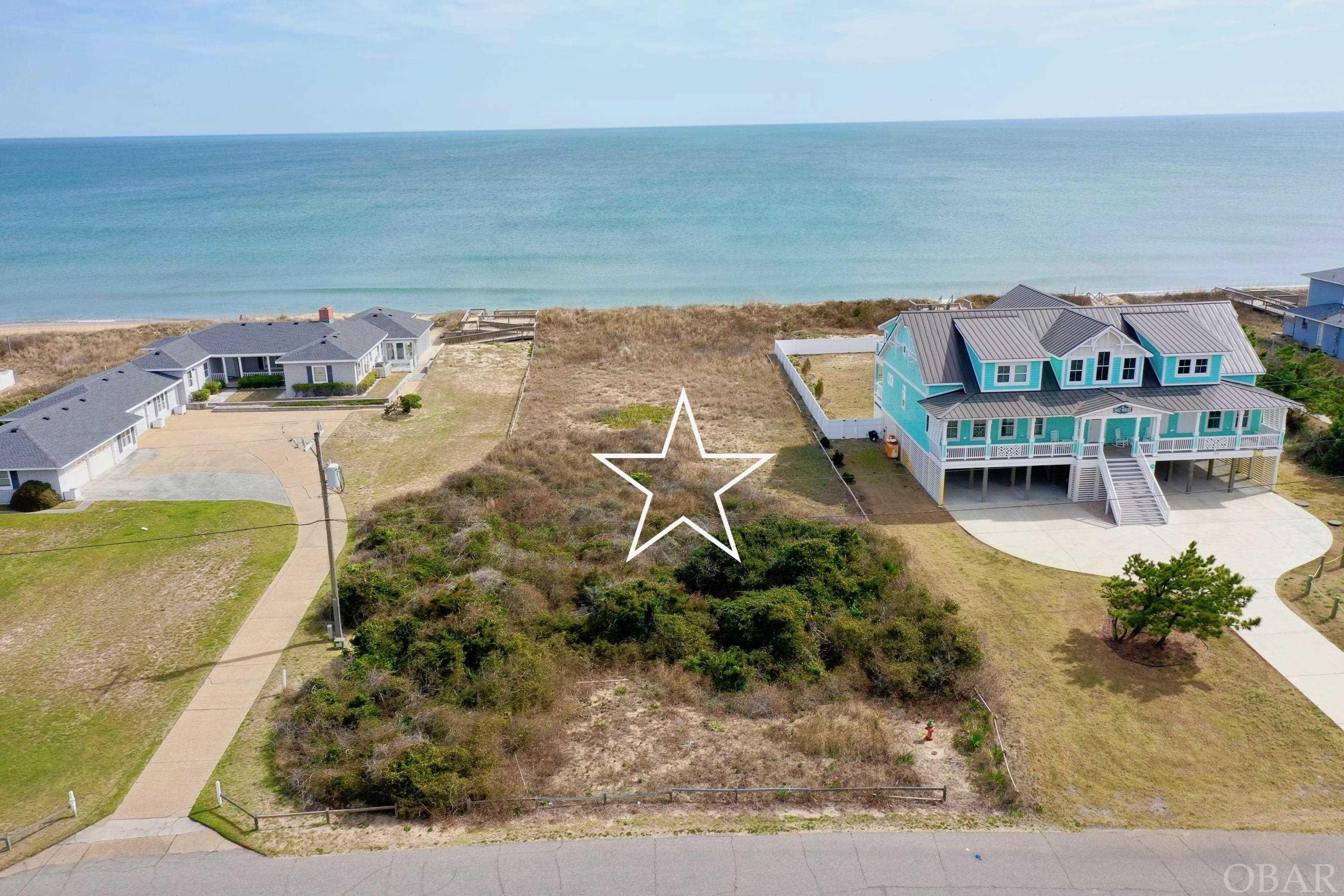 Rare opportunity to own a Premier Oceanfront lot in Southern Shores! There are very few oceanfront lots left in this highly desired location, north of the fork, and in Southern Shores. The Ocean Blvd. section is one of the Most Sought After neighborhoods because of the privacy, the separation between the property and Duck Rd. (very little traffic noise), uncrowded beaches, and the larger homesites. A truly coveted piece of oceanfront. Enjoy all Southern Shores has to offer with it's quaint Soundfront Beach, Playground, Tennis Courts, Picnic Area and 2 Marinas! Build your dream home today on this STUNNING homesite. According to the town of Southern Shores this lot can accommodate a luxurious 7 bedroom home with 5,000 Sq. ft., and allows just a 60' Oceanside setback. Need something larger? You can build the estate 120' from first line of vegetation. Buyers agent would need to confirm. .