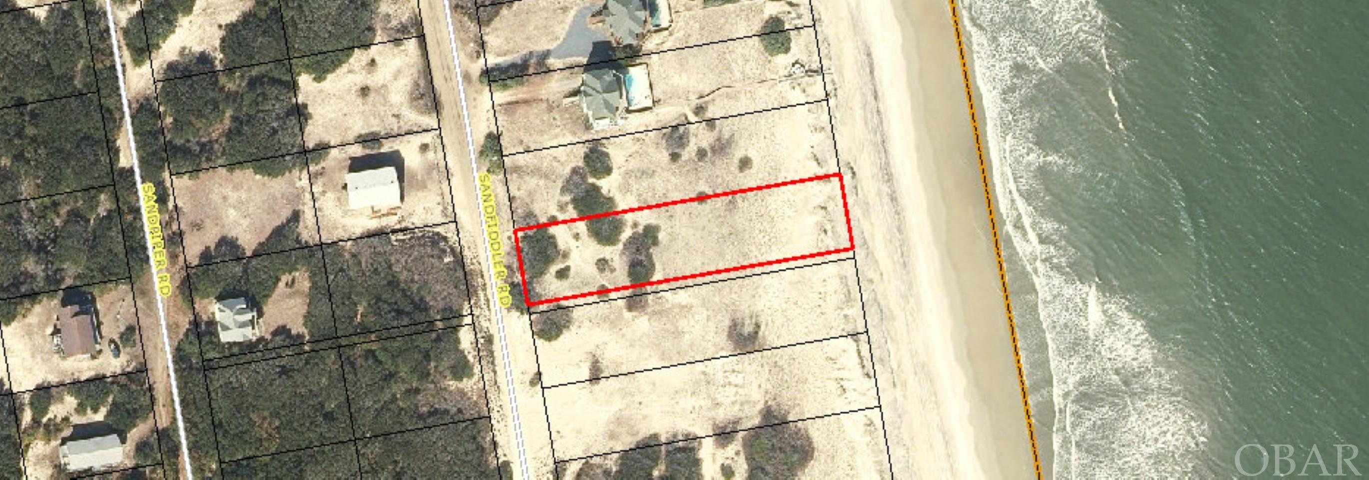 This is an UNREAL oceanfront lot.  Almost entire buildable envelope in the x flood zone and an unbelievable amount of sand and elevation.  Great ocean views just standing on the lot!  This would be a perfect HUGE-VIEW site to maximize a rental home return or use as a personal home and have views from every level of your future beach house.  Located on the secluded North end, this is an absolute gem. This type of oceanfront doesn't come around very often.
