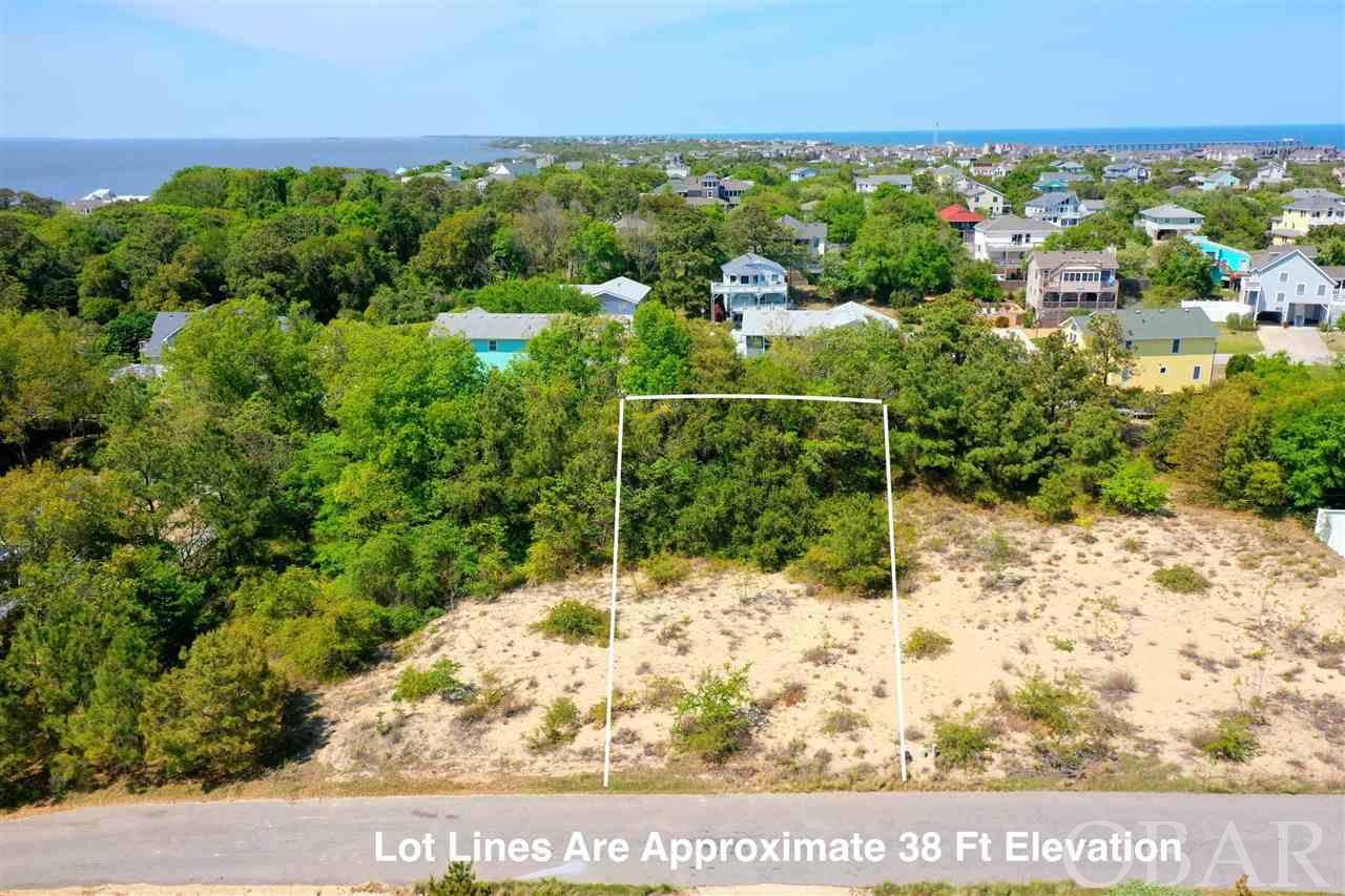 If you have been waiting for the perfect location close to everything in the Village of Duck, this is your homesite. This centrally located lot sits 30ft above sea level in an X Flood Zone (No flood insurance required) and should allow for ocean to sound views. Imagine your dream home on this spacious 16,000 square foot lot, close to everything, but tucked away on this private cul-de-sac in the heart of Duck.