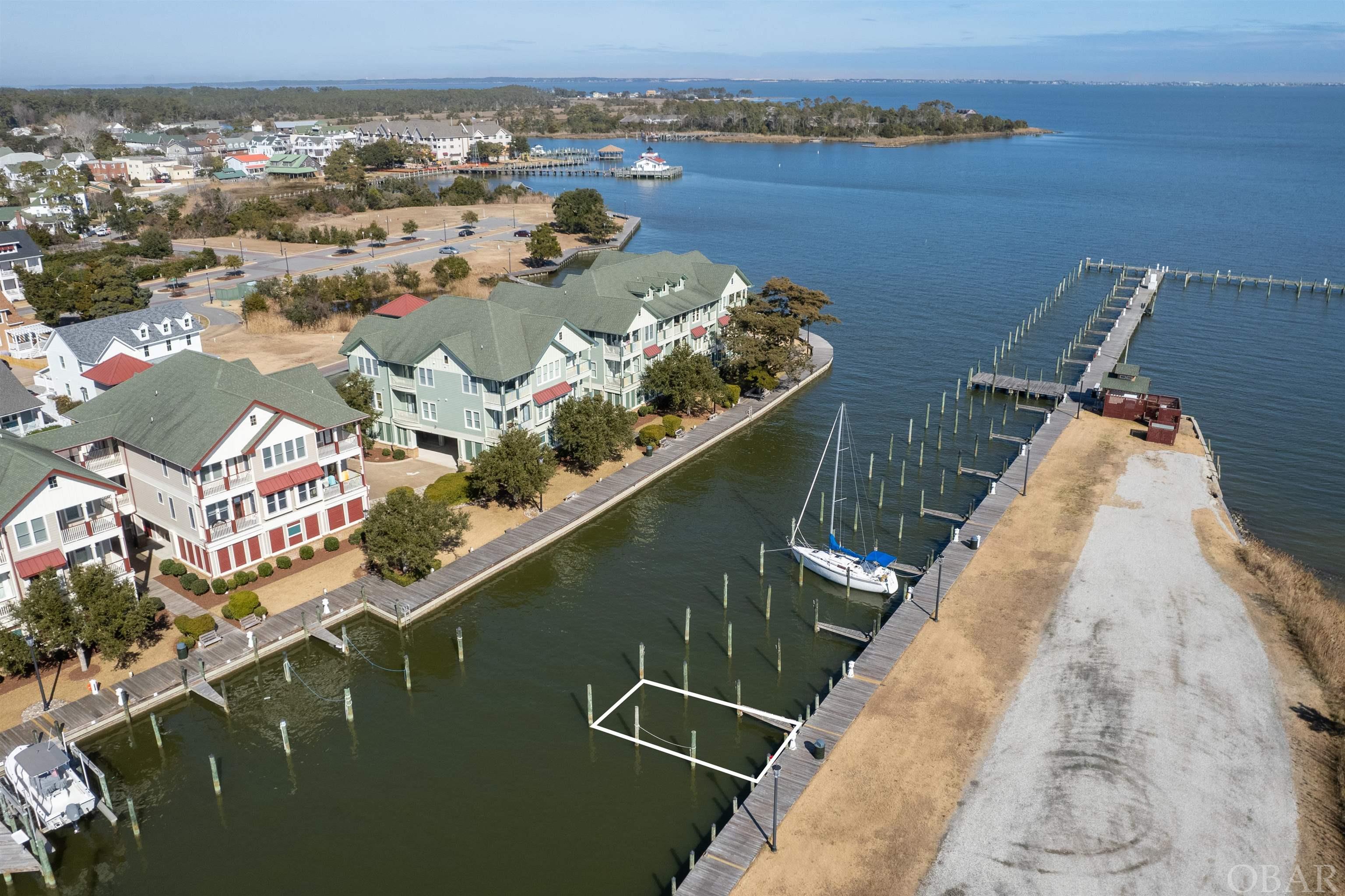 Nestled in the heart of Manteo, this Marshes Light 40X16 boat slip offers location value and easy sound access.  Only steps from the downtown waterfront, slip #16 offers on-site amenities including the "Marina House" a.k.a. the Sales Center which provides full bathing facilities and laundering services.  See associated documents for provided amenities.  Master's Association Assessment dues are $837.50 yearly and Slip Owner's Association dues are $515.00 per quarter.  See associated docs for budgets.