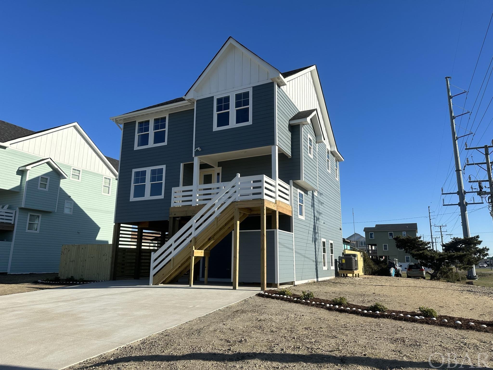 Rare opportunity!...Act quickly on this to be built brand new construction 2023 custom home built by Lenz Homes!  Located in a prime location just two blocks to the Avalon Pier and Awful Arthur’s!...and just 1000’ to the Random Street beach access!...Expect beautiful ocean/sunrise views from this home too!  Flood Zone “X”….average ground elevation 8+ feet!  This home will be carefully crafted using some of the best techniques and materials…vinyl Pella windows, LP Smart Siding, granite and quarts counter tops, GE Stainless Appliances, Craftsman trim and so many other upgrades! Enjoy the 12' X 24" private pool and 18’ X 14’ game room after a day at the beach. May 2023 completion date (or sooner).  Builder available to meet interested buyer clients.