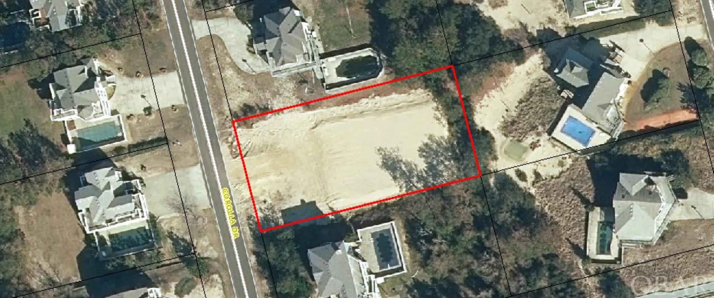 Fantastic Whalehead 5th row lot already cleared, house pad filled, and stabilized.  This 20,000 sq ft lot is ready to go.  Just one lot away from walkway directly to the beach!  This one is a must see for those ready to build! X Flood Zone!