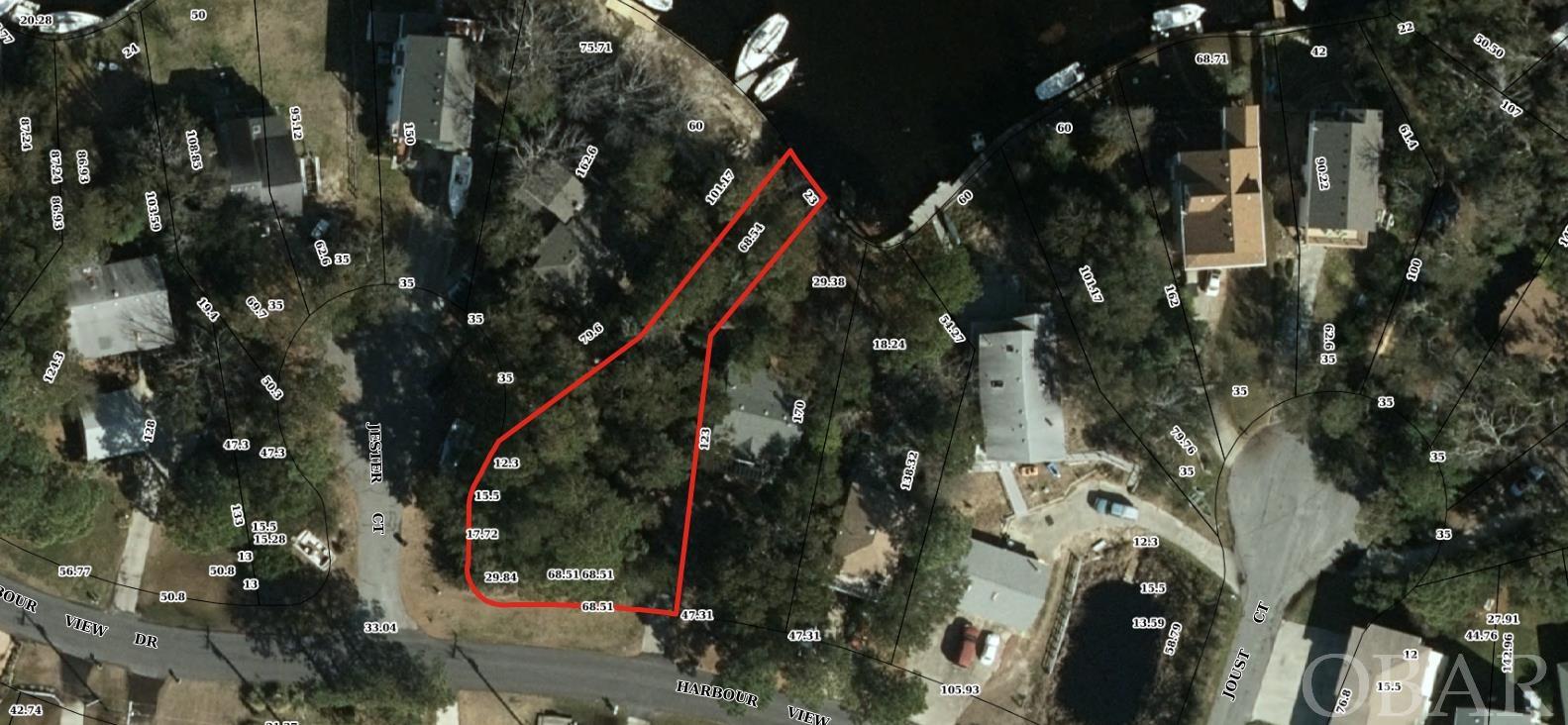 CANALFRONT LOT w/sound views in the community of Colington Harbour.  Large corner lot with EXCELLENT ELEVATION!  GREAT LOCATION!  Enjoy fabulous water views of the Albemarle Sound directly across the street!  Lovely expansive canal views of Inlet w/ 23 FT deep water canal frontage!