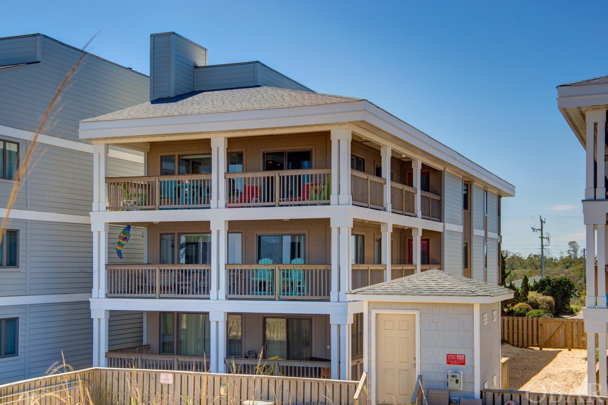 Experience Oceanfront living at its finest in this S. Nags Head condo at Diamond Shoals. This first-floor unit (easy in, easy out) is beautifully maintained with special touches to enhance your comfort during your stay. This three-bed (plus bonus room), two full bath gem has plenty of room to spread out. The kitchen is well equipped, and you'll have plenty of dining space for the whole family. Enjoy the outdoors under the covered deck, or spend the day on the beach or community pool, right outside your door. Ceiling fans and other premium touches throughout make this the perfect getaway. Reach out to your favorite realtor for a private tour!