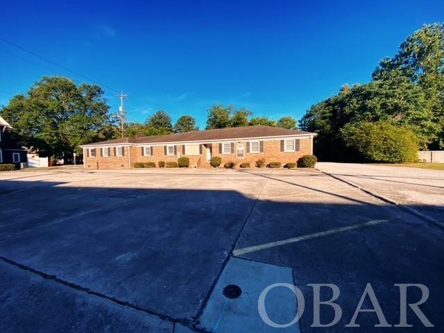Great visibility on the corner of N Road St and Colonial Ave with a high daily traffic count. This sale includes two office buildings with parking & vacant lot. Total lot size is 0.67 acres for all 3 parcels. Located in the central business district this parcel is intended to accommodate a wide variety of commercial activities. The main building has 17 paved parking spaces and the second building has 5 parking spots on a gravel lot. The vacant lot could allow for more parking or future expansion. The building is tenant occupied with a lease in place. Easy access to HWY 17! Located downtown.