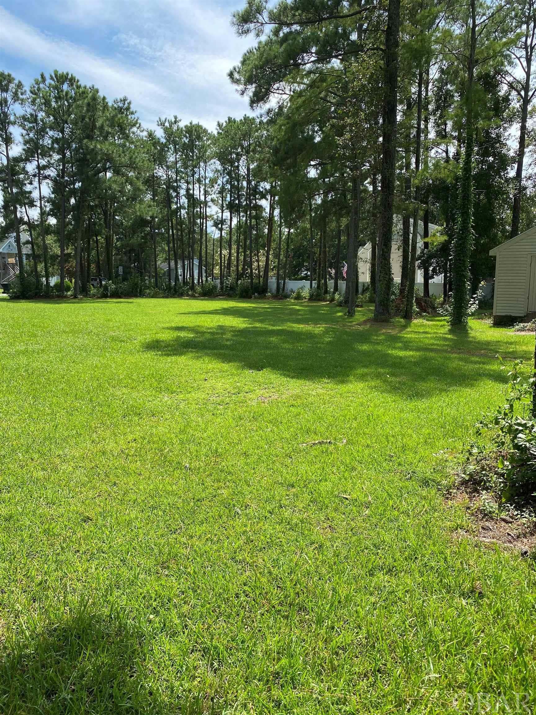 Large lot in great community. Close to downtown Manteo. Call today!