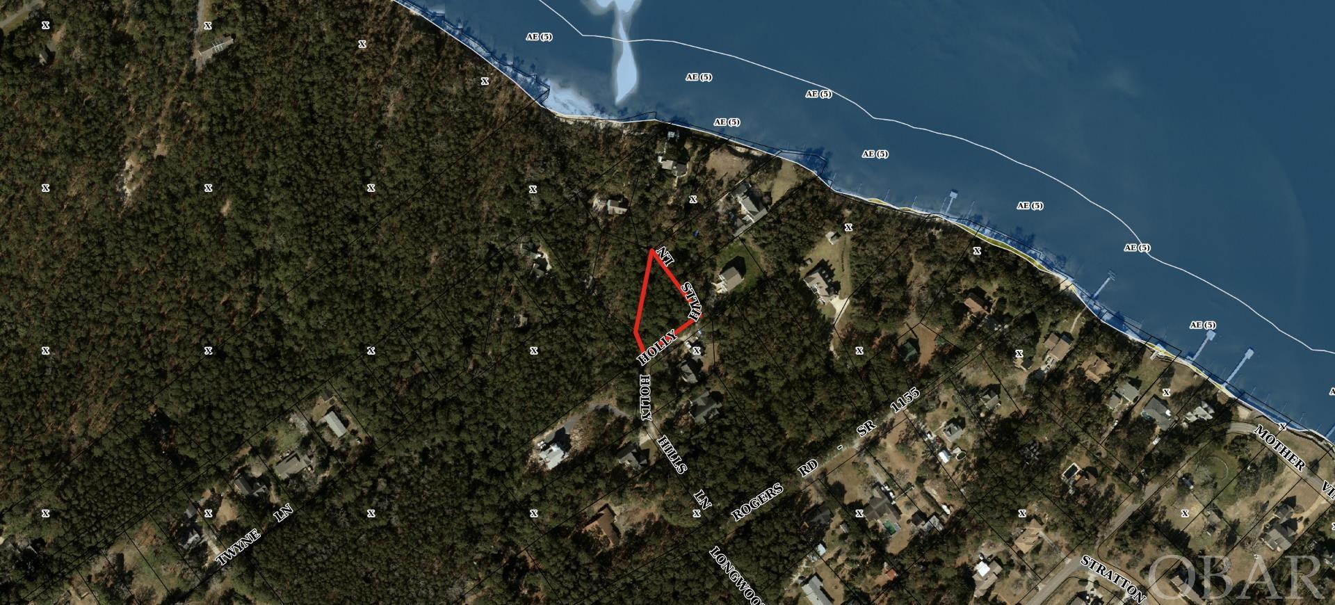 This lot is a gem! It has sound views while being one of the highest properties on Roanoke Island. It is located in a peaceful quiet neighborhood with few houses and lots of trees, and a short walk or bike ride to all three schools in town. Owner also has 104 Holly Hills Ct and is willing to sell both at a discounted price.