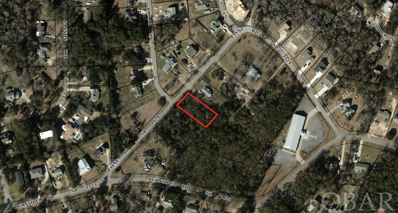 Located in a quiet neighborhood, this beautiful wooded lot could be yours! This lot is located down the street from the sound and just a short drive to the heart of Downtown Manteo. Call your agent call your builder and get your dreams of owning on the OBX come true.