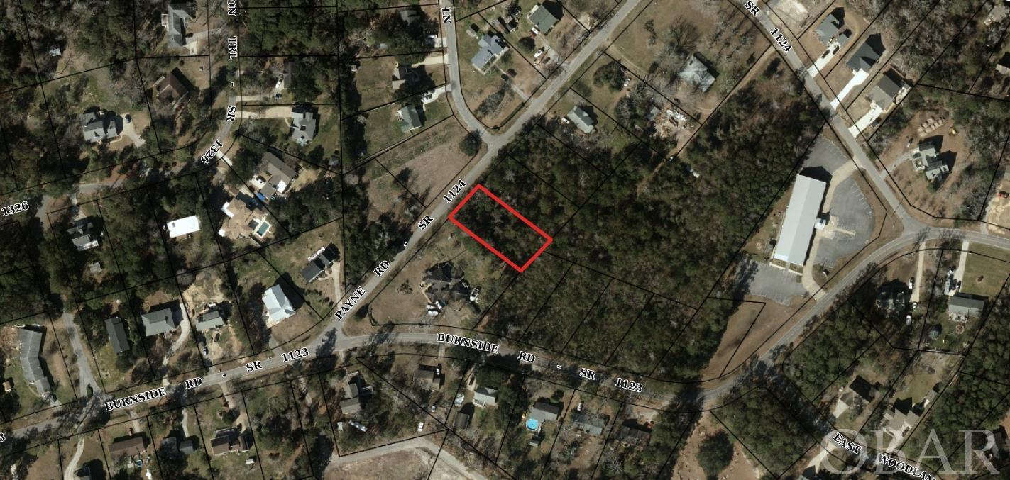 Located in a quiet neighborhood, this beautiful wooded lot could be yours! This lot is located down the street from the sound and just a short drive to the heart of Downtown Manteo. Call your agent call your builder and get your dreams of owning on the OBX come true.