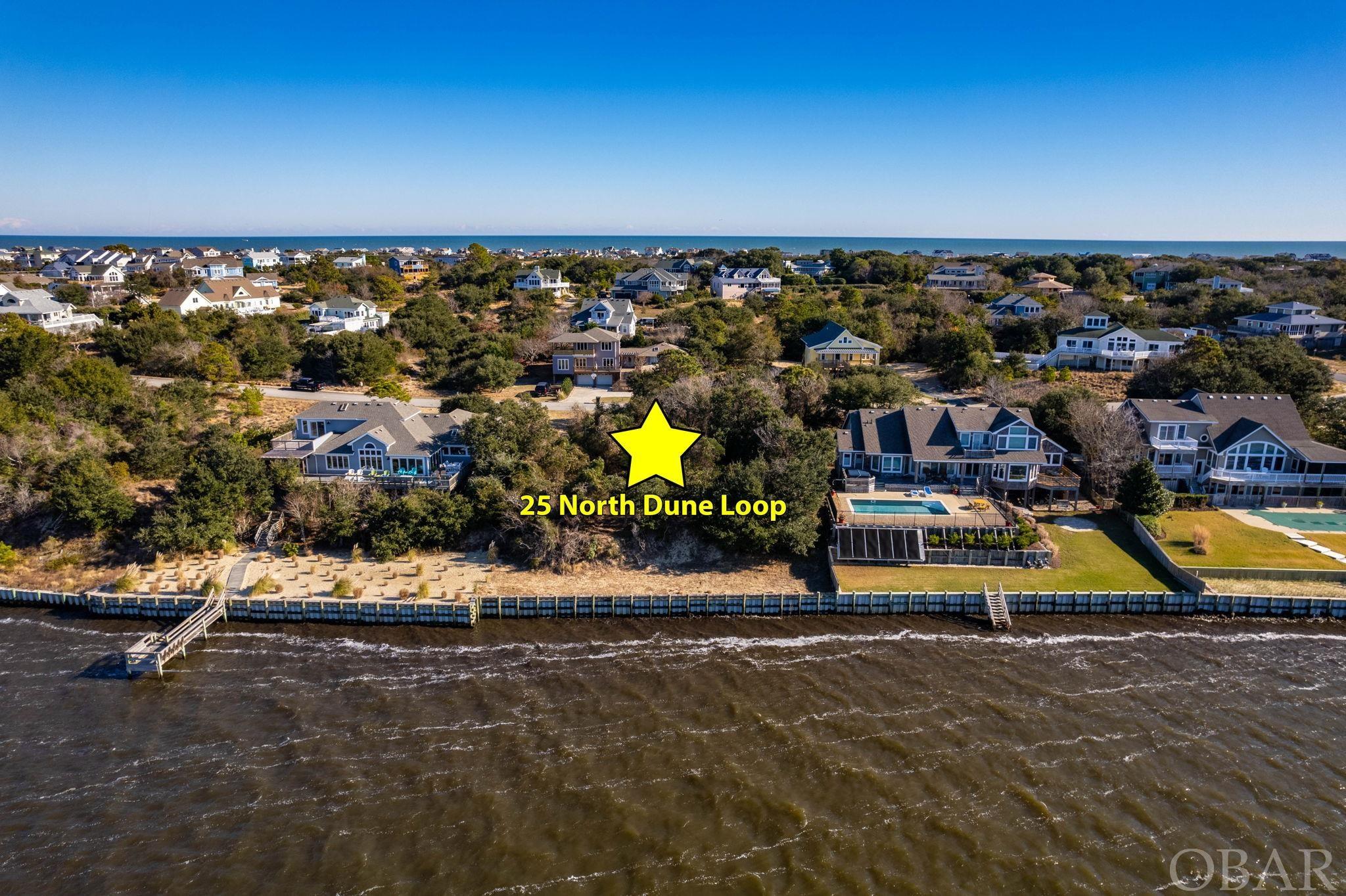 Enjoy beautiful sunsets, sound views, winter swans, osprey, etc., from this perfect location for your dream home in a quiet neighborhood with mostly year-round residents living on the street.  Take advantage of a rare opportunity to own a soundfront lot in this upscale area of Southern Shores in an X Flood Zone.    Bulkhead was replaced in 2021.  Join the Southern Shores Civic Association(SSCA) for $65 annual fee to have parking access at Hillcrest Beach, $25 to join Tennis Club, $25 for the Boat Club, and you will have many social opportunities to meet new friends, volunteer, and partake of picnics at the marina. It is a short distance to the beach, Sea Oats Park, Marinas for boat access, Soundview Park and the Duck Boardwalk, restaurants and shops.