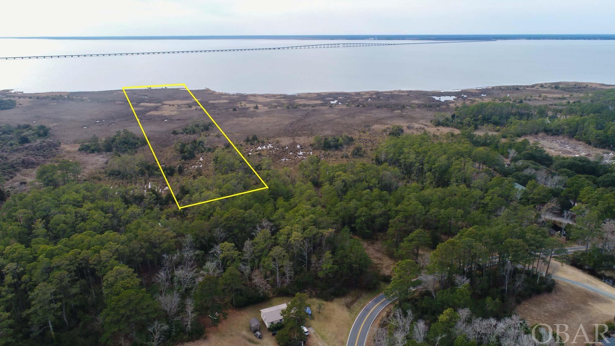 Soundfront property on the westside on Roanoke Island. Over 8 acres of privacy. This property has some higher ground towards the road.  The majority of the property is marsh.  The property between this lot and the road is also for sale.