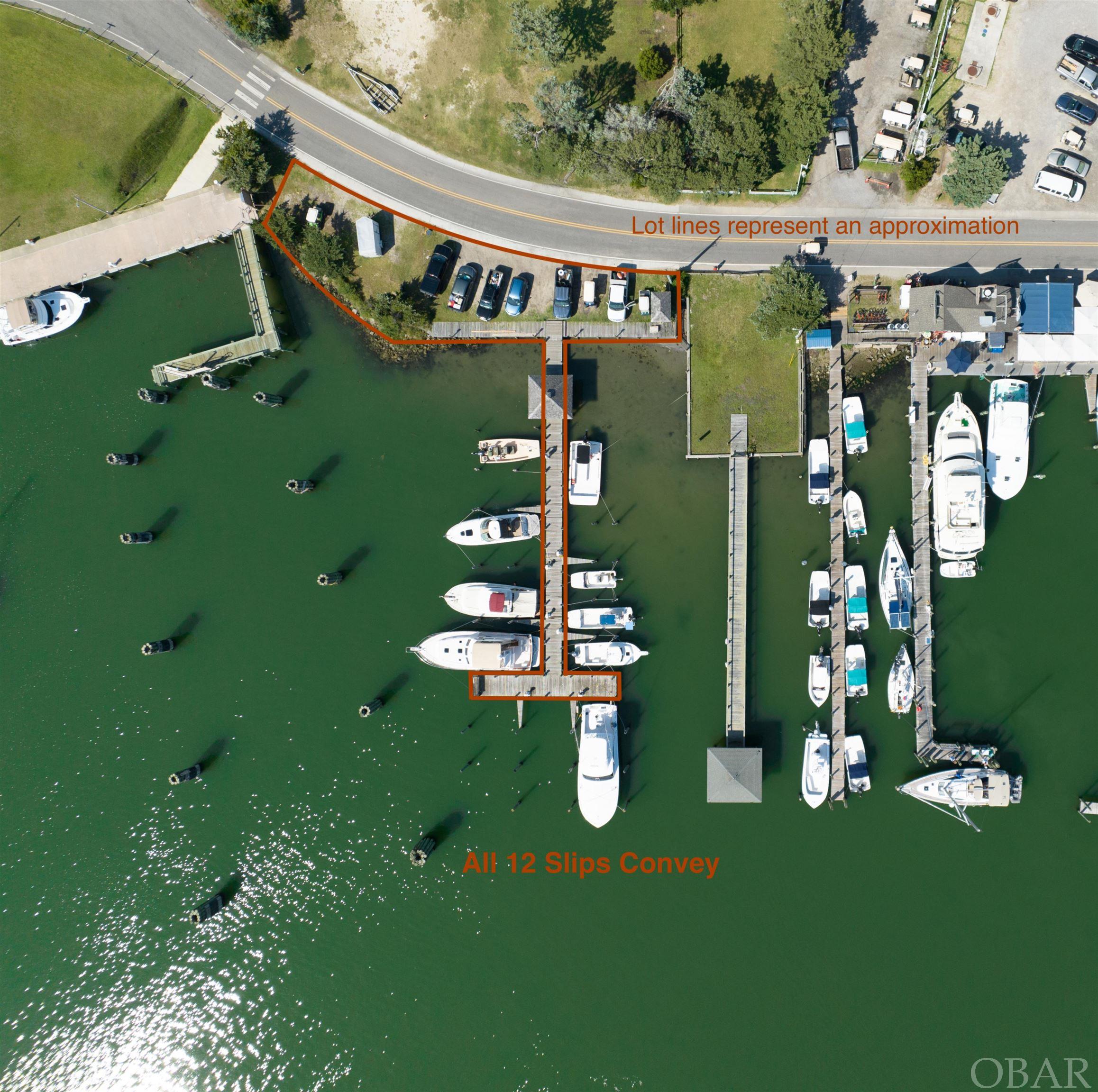 Opportunity to own a 12 slip marina located in a prime commercial and residential location on Silver Lake. The available dockage is suitable for deep draft offshore fishing vessels, recreational fishing boats, and sailboats. 156 feet of road frontage on Highway 12. Ample parking available on 5,800 sq ft of land, adjacent to docks and Highway 12, that also conveys with the pier. Power and water connections on site. Three deep water slips at the end of pier accommodate vessels up to 55' length, 18' beam, and depths up to 12'. Slips range in size from 18'-12' beam and 55'-23' length. Approximation of depth, beam, and length per slip available in supporting documents. Permissible temporary structures could be built on adjacent land. Located between the NPS docks and the Anchorage.