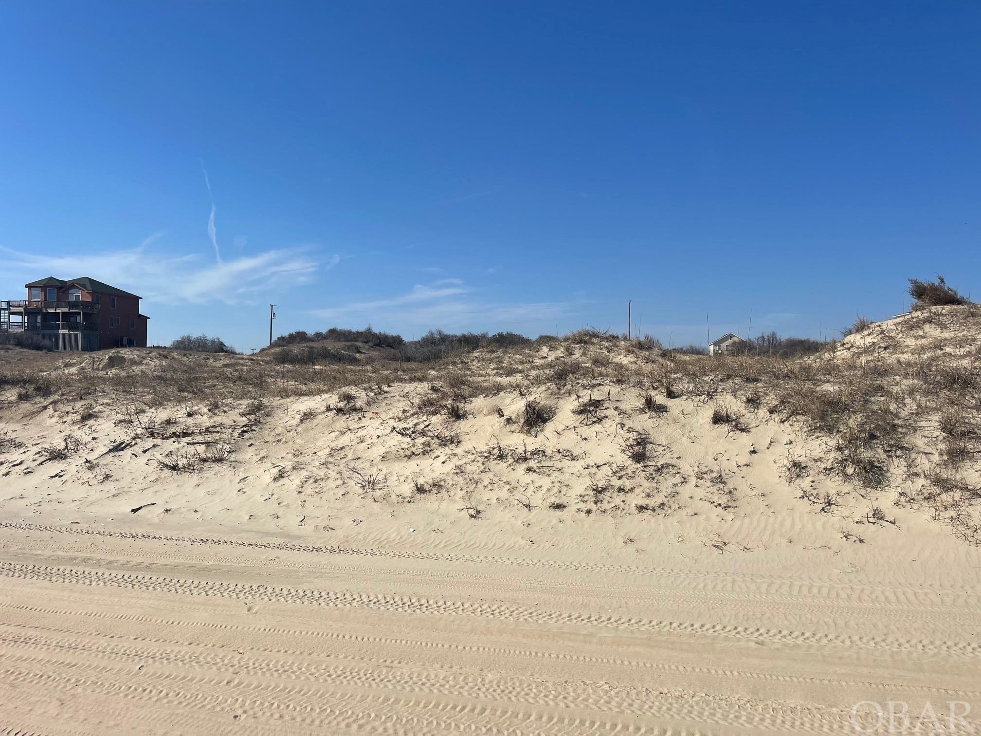 Remarkable semi-OF lot in desirable North Swan Beach!.  Located in the x flood zone, this lot has ocean views just standing on the lot.  Would make a great location for a second home or vacation rental property.  Platted easement to the beach adjacent to the north side of the lot!  This is a must see and wont last long.