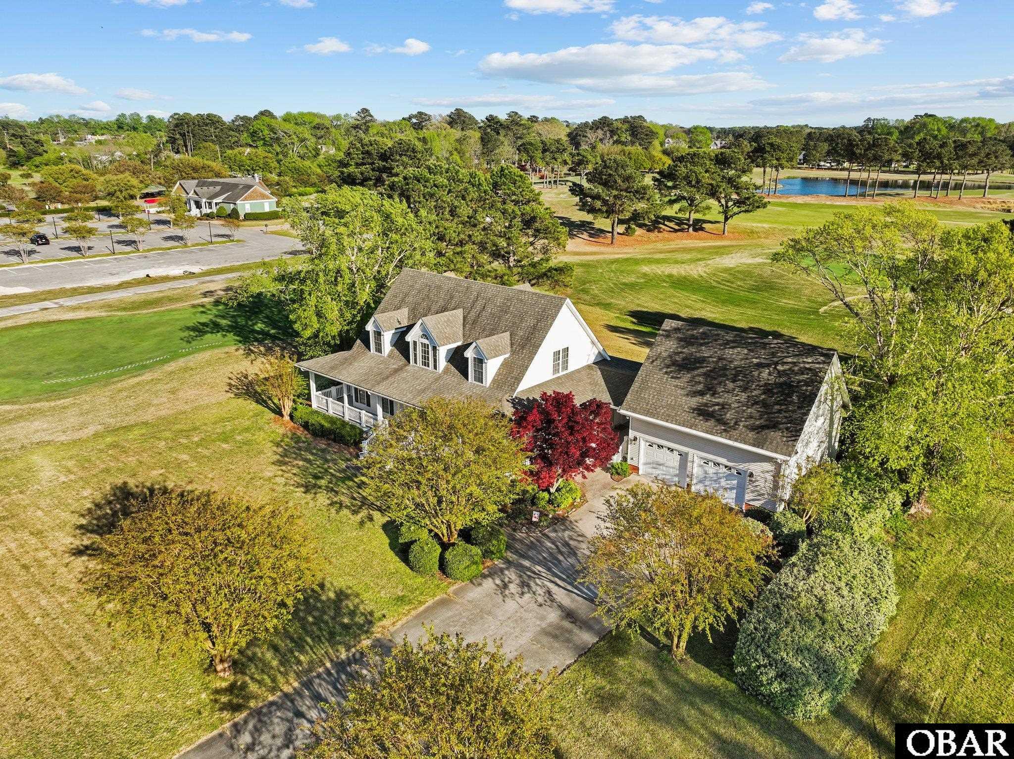 Close to the putting green, pro shop, pool and tennis courts